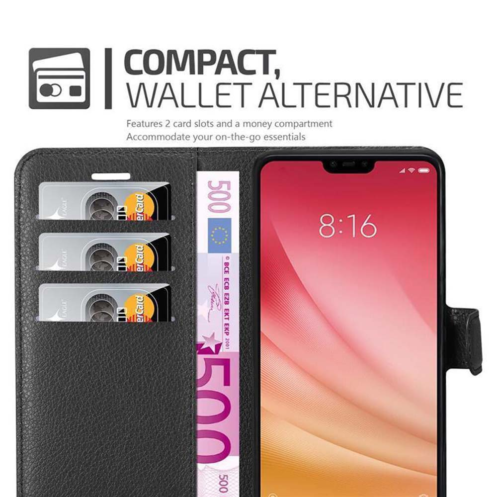 Custodia nera per telefono con slot per carte e denaro. Telefono con schermo rosso. Sfondo nero.