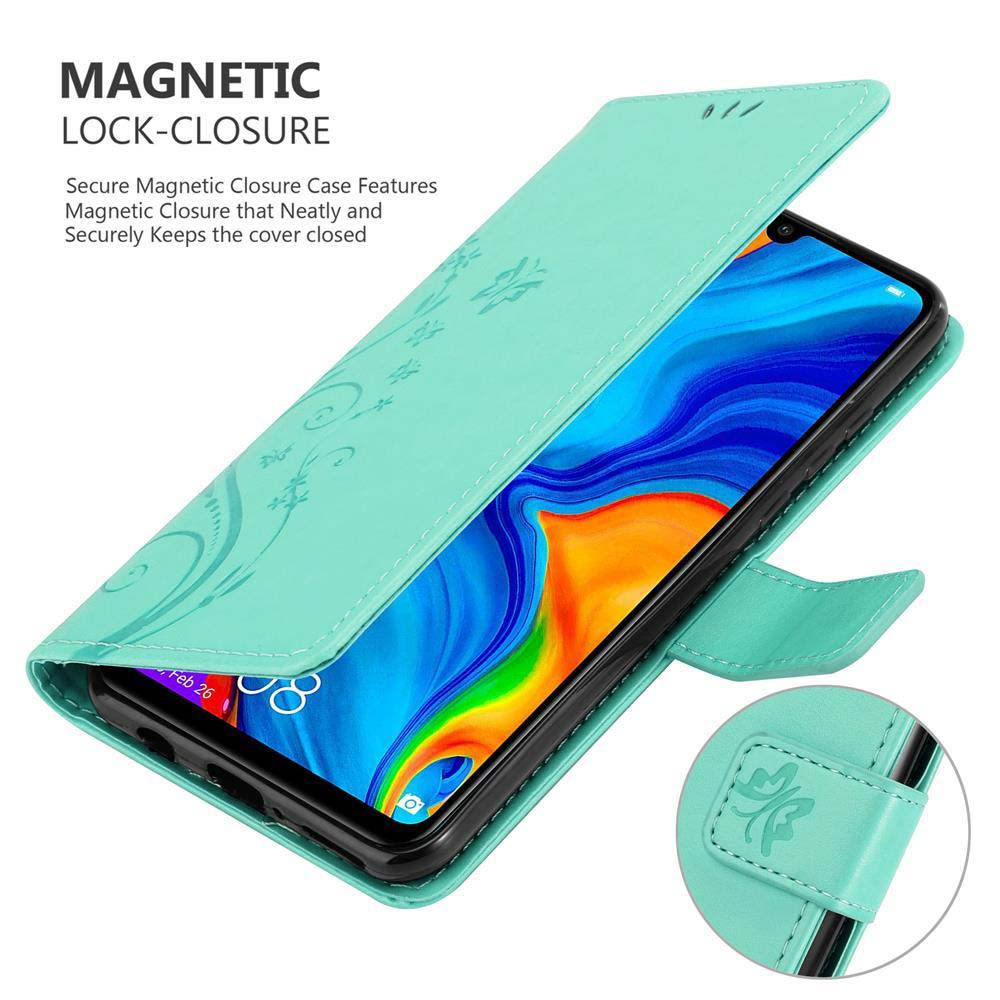 Custodia del telefono verde acqua aperta con telefono all'interno. Motivi floreali visibili. Testo chiusura magnetica.