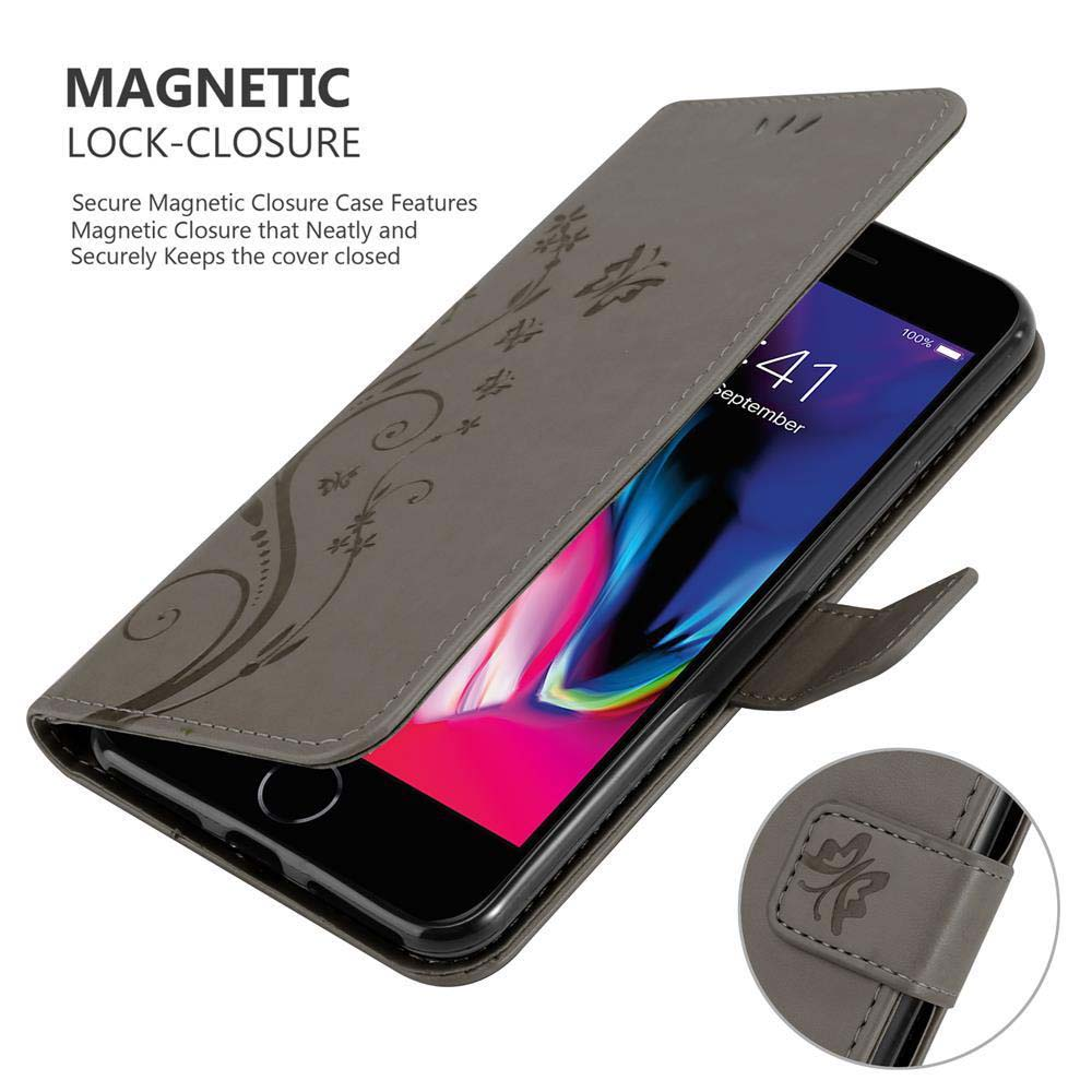 Telefono in una custodia grigia, con design floreale, aperto, che mostra lo schermo.