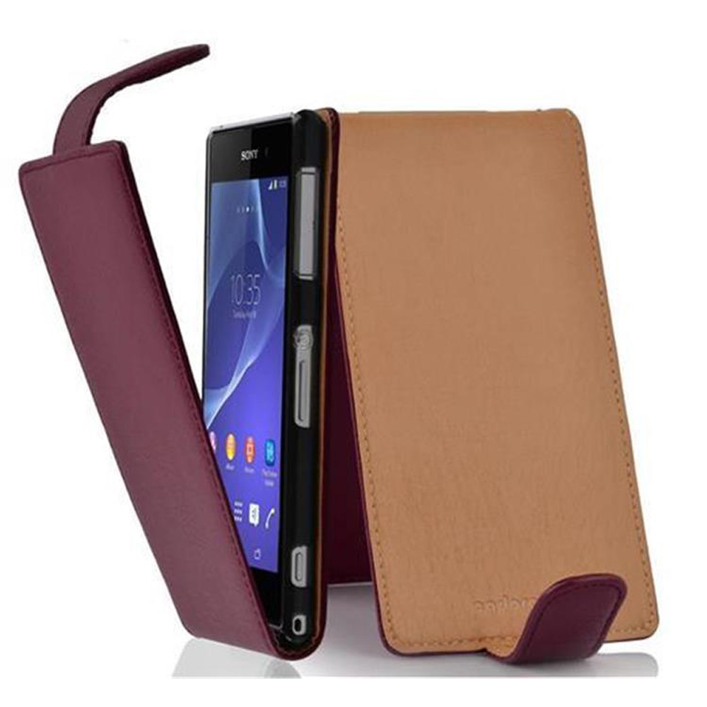 Teléfono en funda burdeos. La funda está abierta. Se ve la pantalla del teléfono.