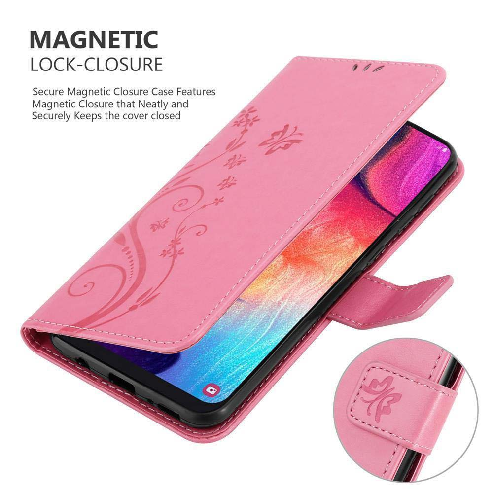 Una custodia per telefono rosa, aperta, con un telefono all'interno. Ha un design floreale e una chiusura.