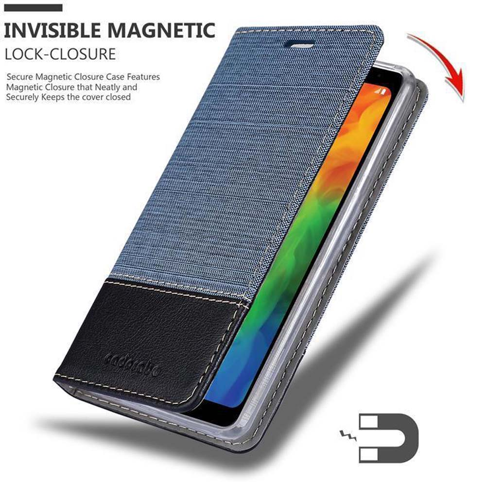 Custodia per telefono in stile denim, aperta, che mostra uno schermo del telefono con un'immagine colorata.