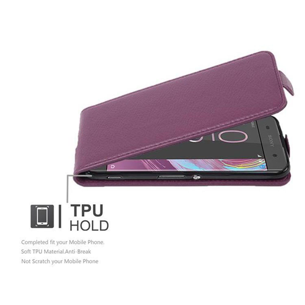 Telefon in einer Hülle. Die Hülle ist lila. Das Telefon ist schwarz. Text: TPU HOLD. Die Hülle ist offen.