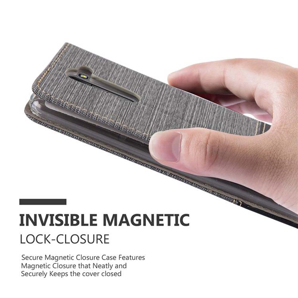 Mano che tiene una custodia del telefono chiusa. La custodia è grigia. Testo: Chiusura magnetica invisibile. Sfondo: bianco.
