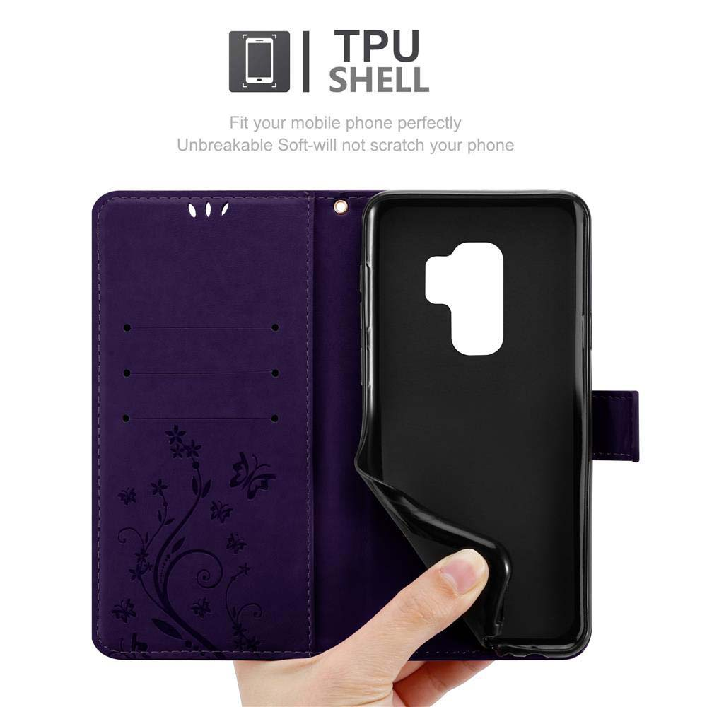 Custodia viola per telefono, aperta, con un telefono nero all'interno. Testo: Guscio in TPU.