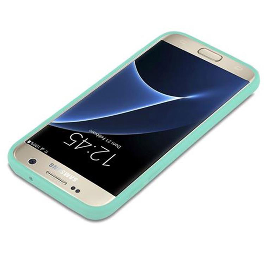Un telefono con una custodia verde, lo schermo mostra un design a onde blu e bianche.