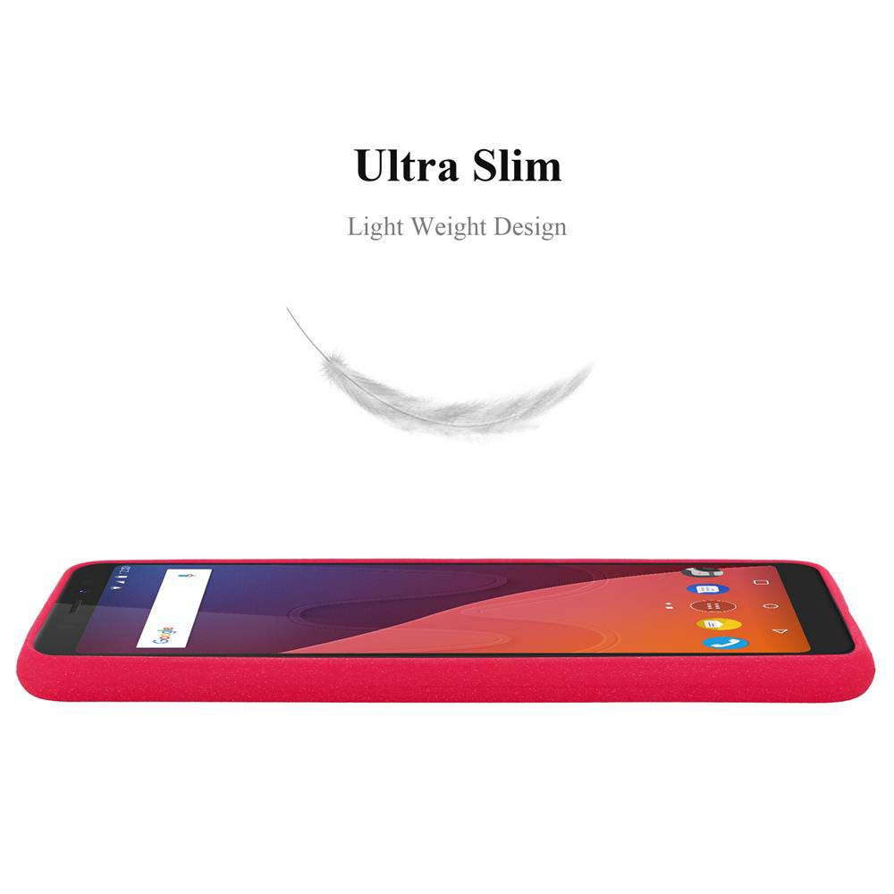 Telefono rosso, design sottile, una piuma che fluttua sopra.