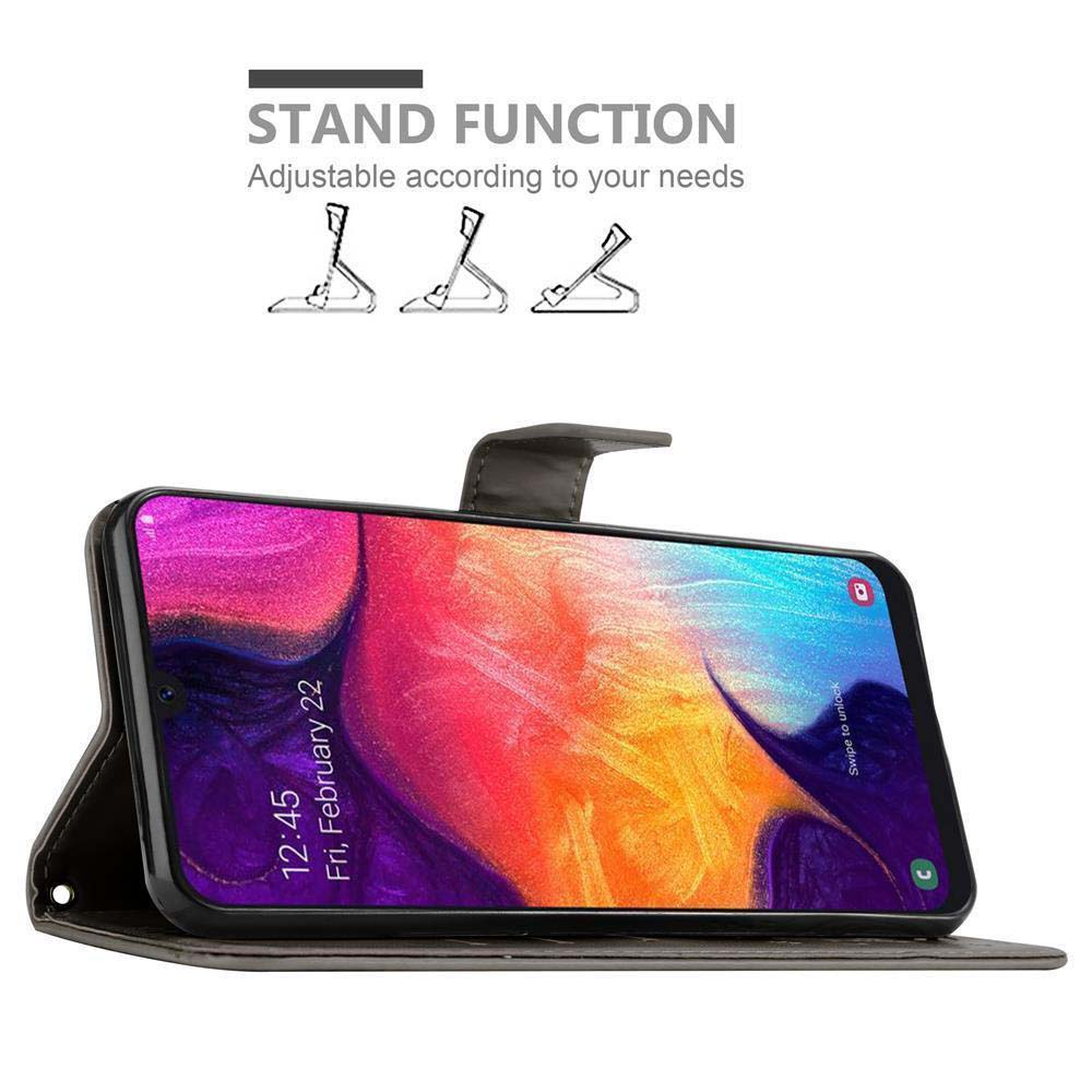 Un telefono in una custodia, aperto a un display. Il testo recita 'Funzione supporto' con icone di supporto regolabili.