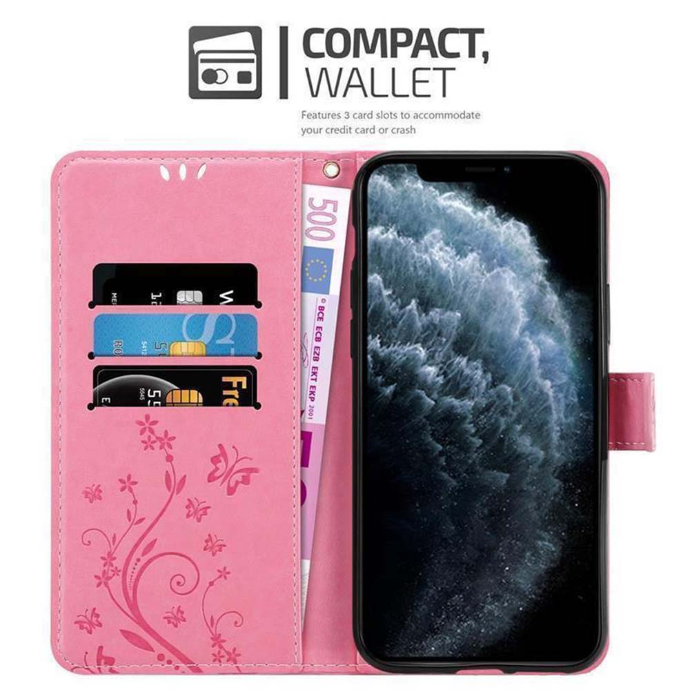 Portafoglio rosa per telefono con carte e denaro visibili.