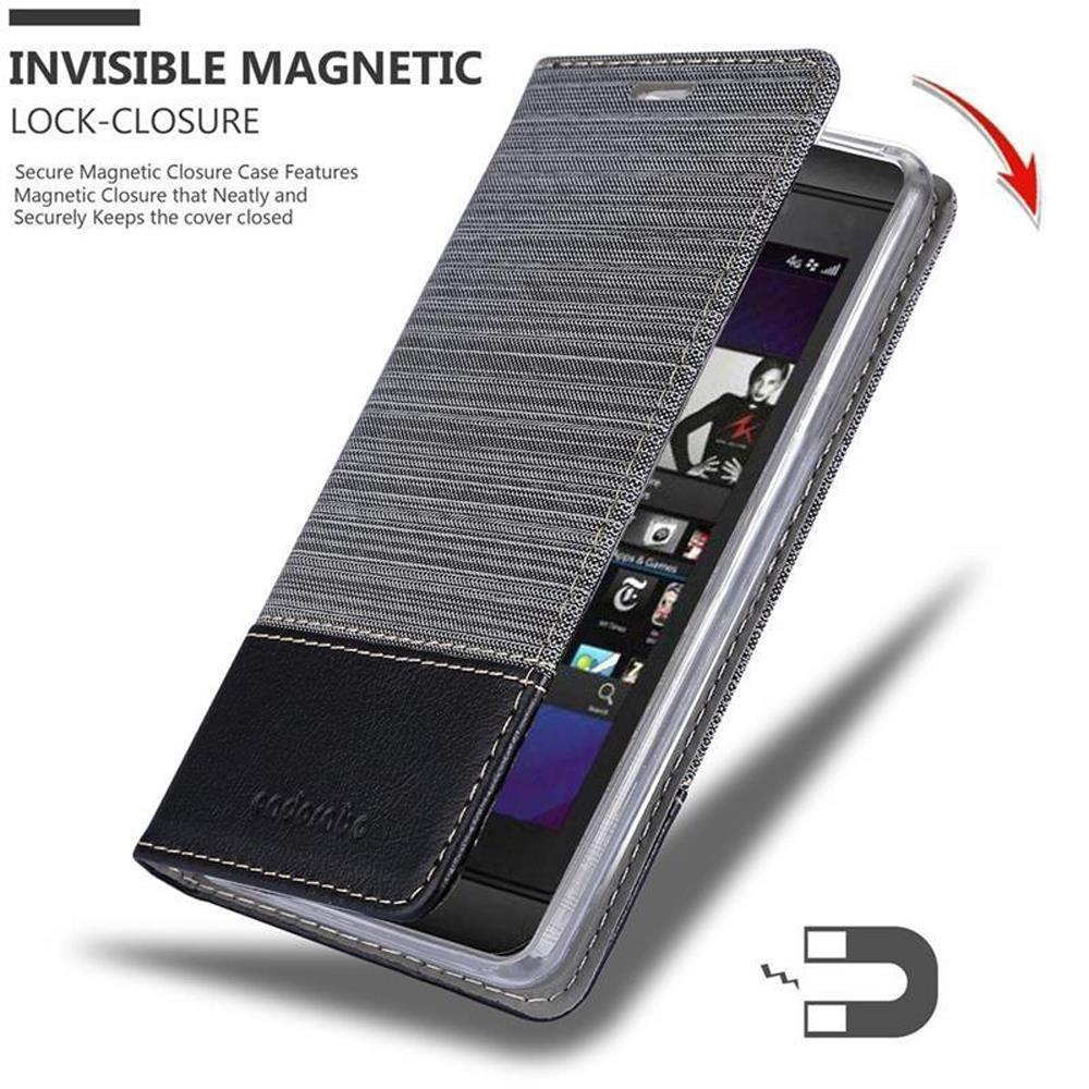 Telefono all'interno di una custodia. Testo: Chiusura magnetica invisibile. Dispone di una chiusura magnetica sicura.