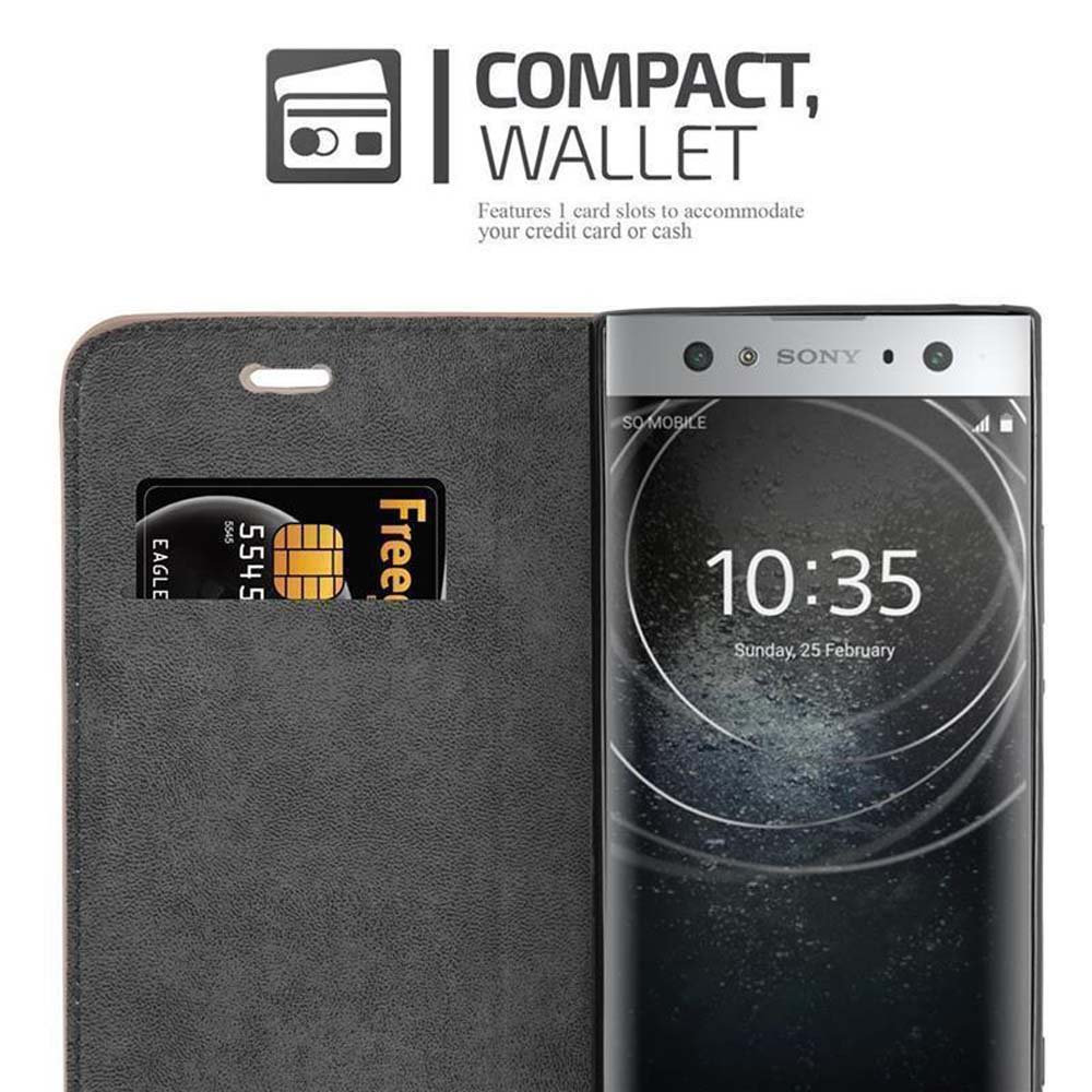 Teléfono negro con tarjeta de crédito. La funda está abierta, mostrando la hora en la pantalla.