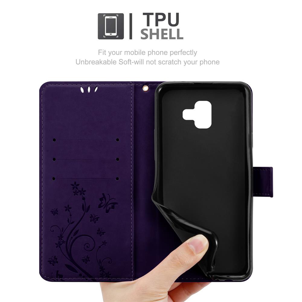 Custodia per telefono viola, aperta, con un inserto nero. Una mano tiene l'inserto nero.