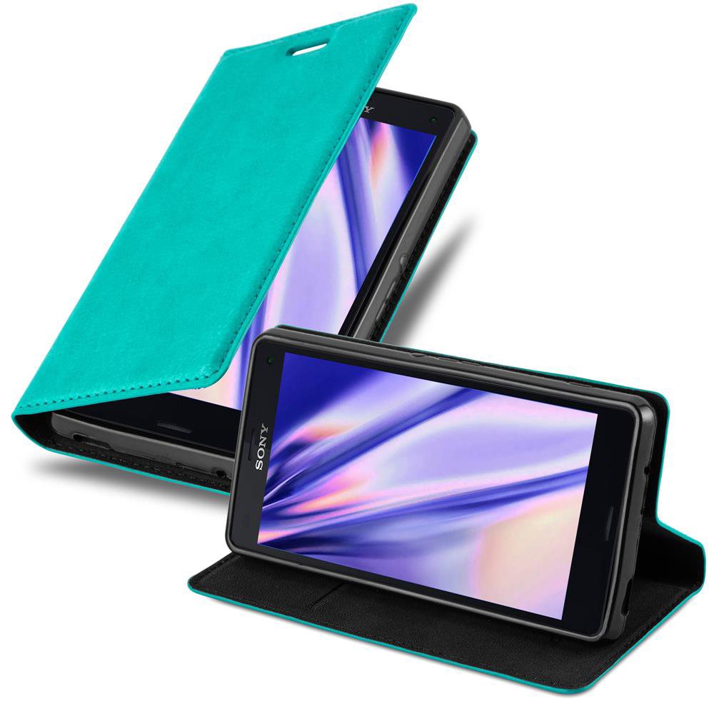 Funda de cuero turquesa con teléfono. La tapa está abierta, mostrando la pantalla.