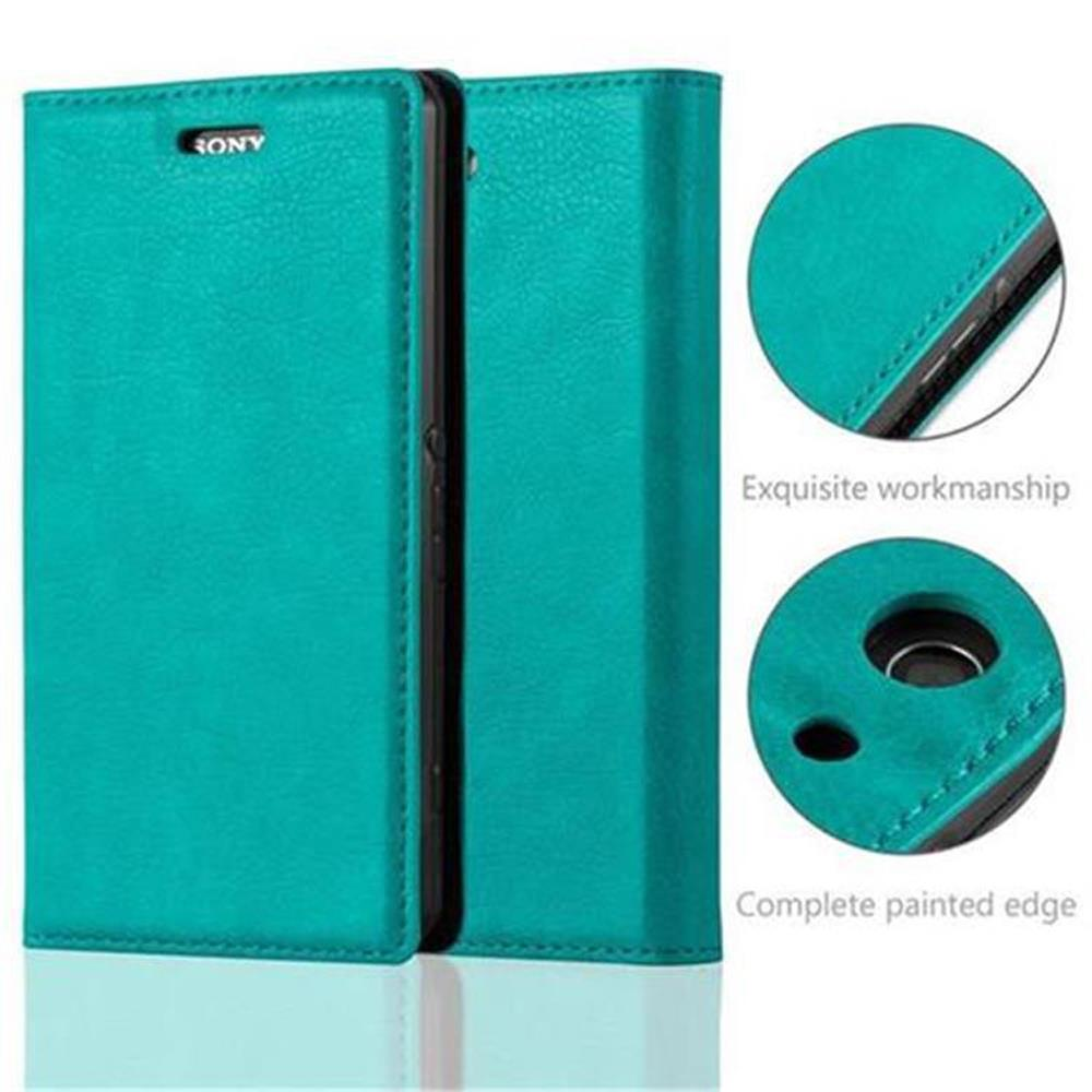 Funda de teléfono verde azulado, cerrada, con detalles. Fondo blanco, mano de obra exquisita.