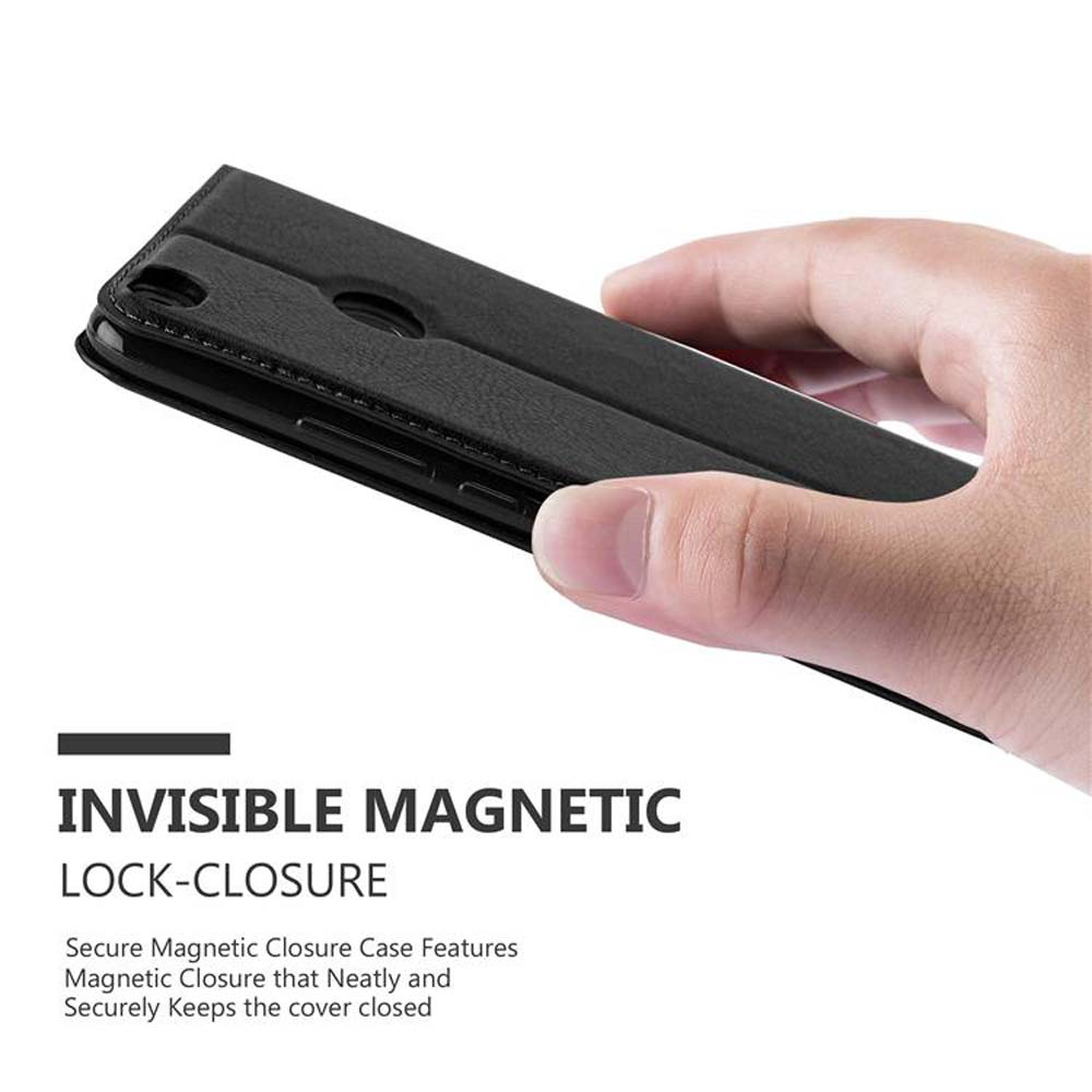 Mano che tiene una custodia nera con chiusura magnetica. Testo: 'Invisible Magnetic Lock-Closure'.