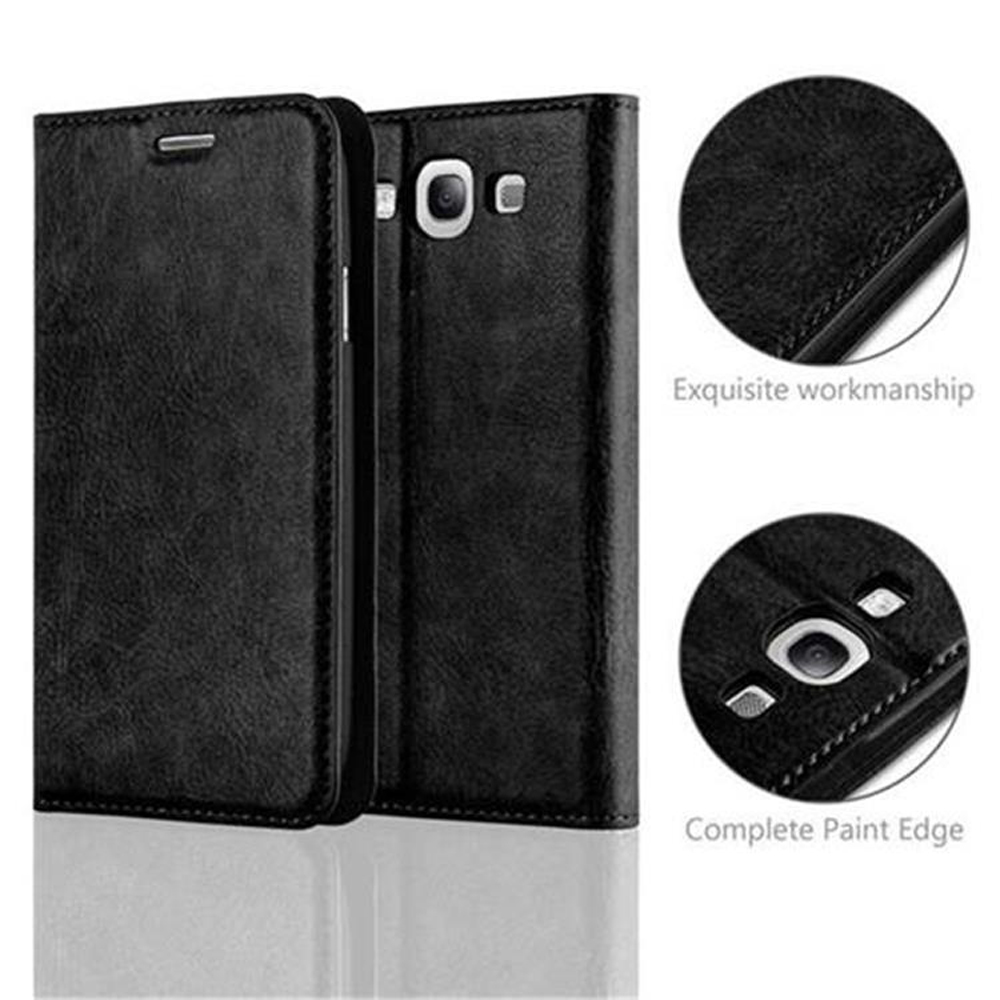 Funda de teléfono negra, cerrada. La cubierta frontal está en el lado izquierdo. Funda de teléfono.