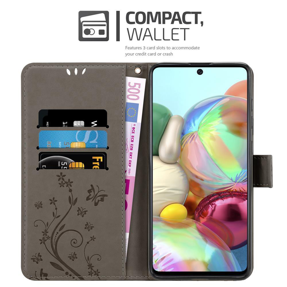 Custodia a portafoglio con telefono. Telefono che mostra lo schermo con l'ora e le app. Tre slot per carte. Design floreale.