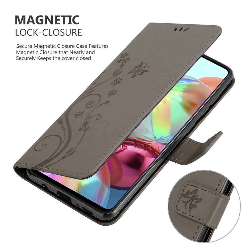 Custodia grigia per telefono con un telefono all'interno. La custodia ha un design sul davanti. La custodia è aperta.