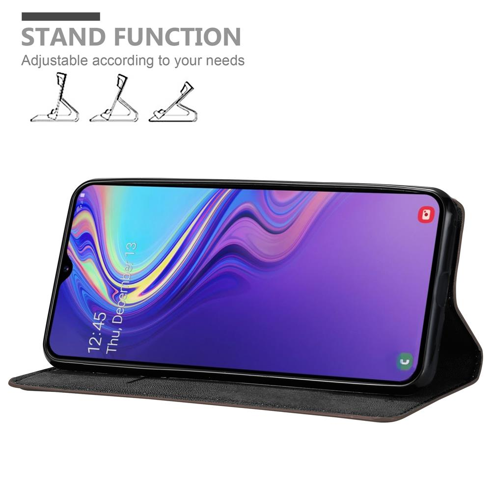 Telefon in einem Flipcase, geöffnet zum Aufstellen. Zeigt die Uhrzeit an.