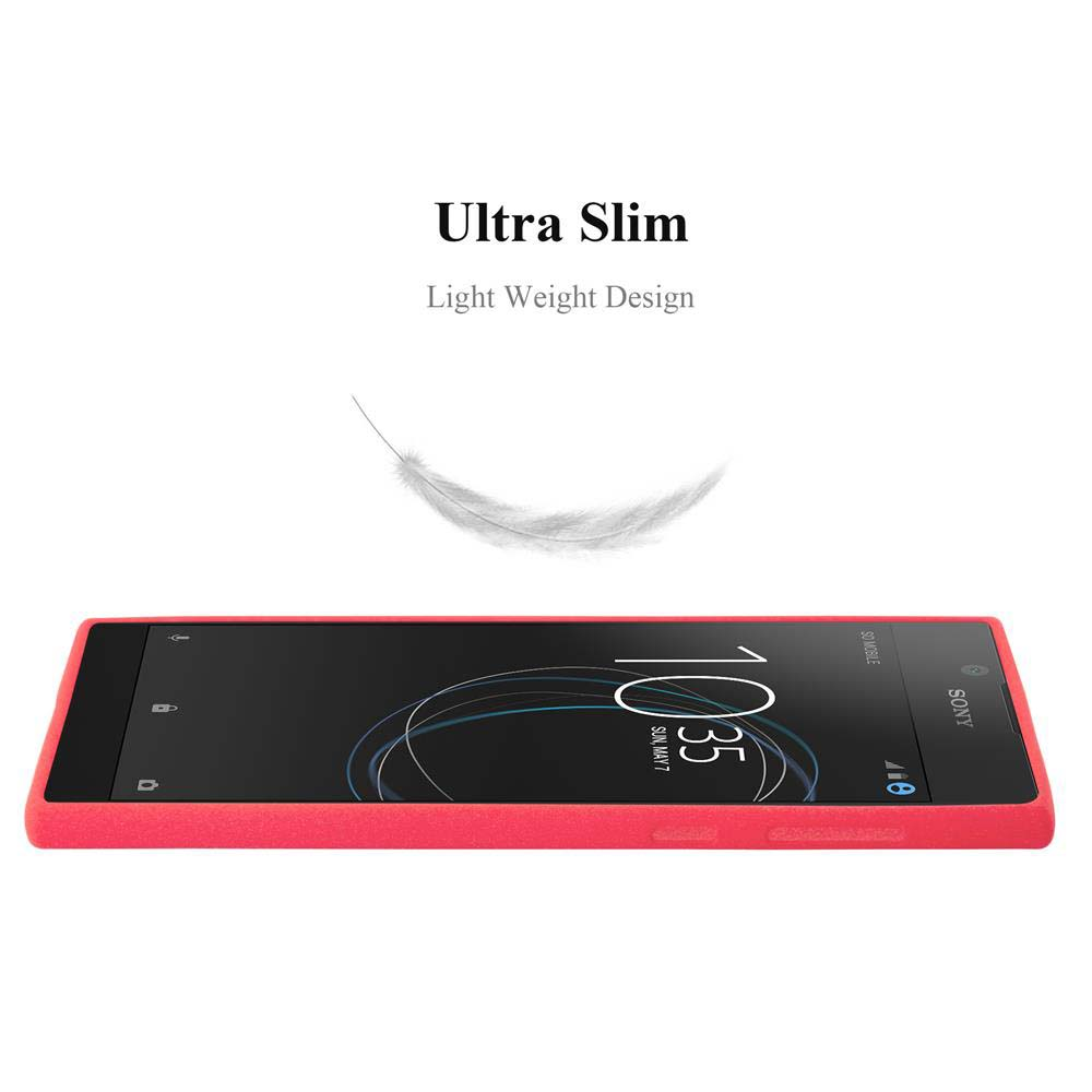 Telefono rosso su sfondo bianco. Una piuma fluttua sopra il telefono.