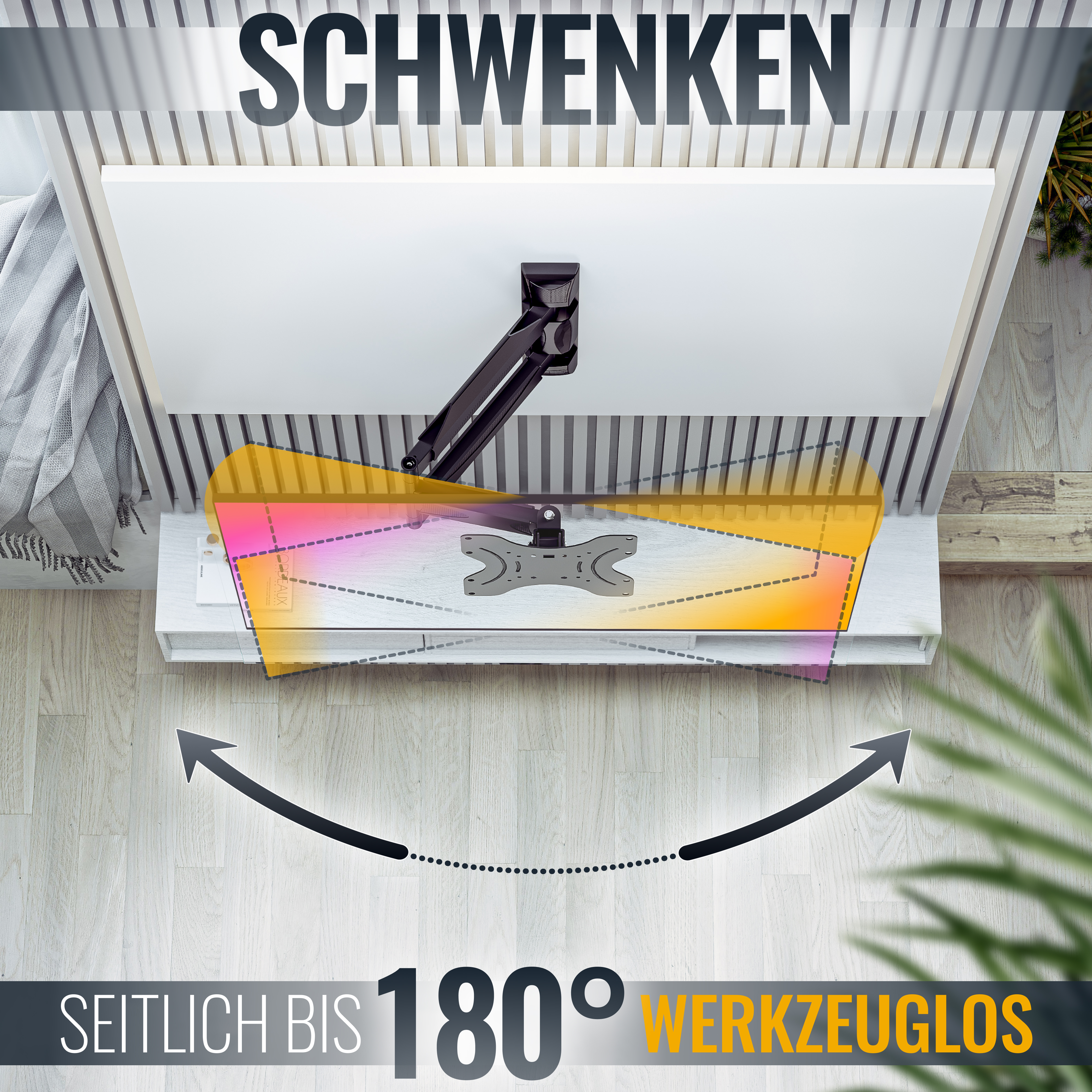 Ein weißer Fernseher ist an einem schwarzen Arm montiert, der Arm an einem weißen Regal. Der Fernseher kann rotieren.