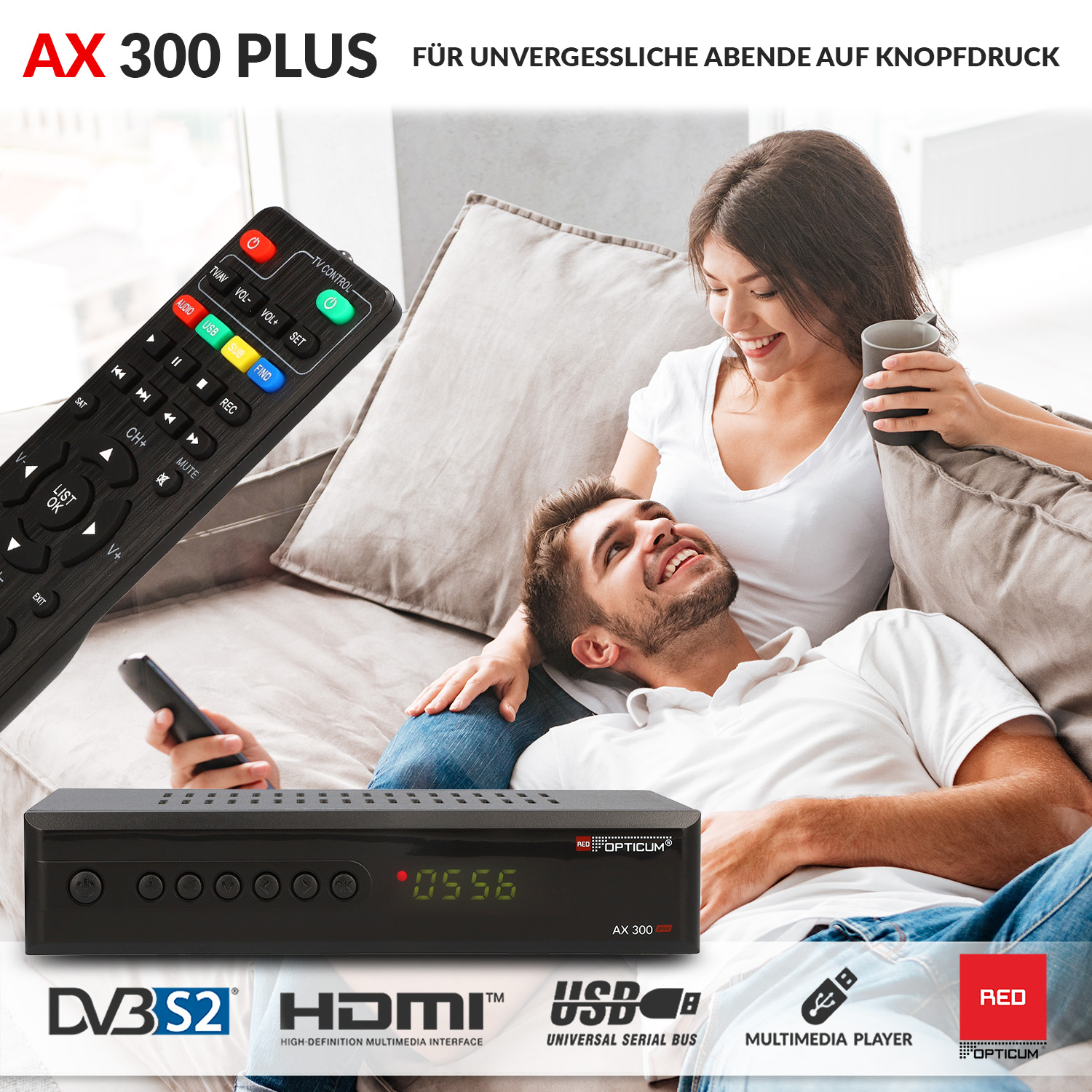 Ein Paar schaut fern, mit einer schwarzen Set-Top-Box und Fernbedienung im Vordergrund.