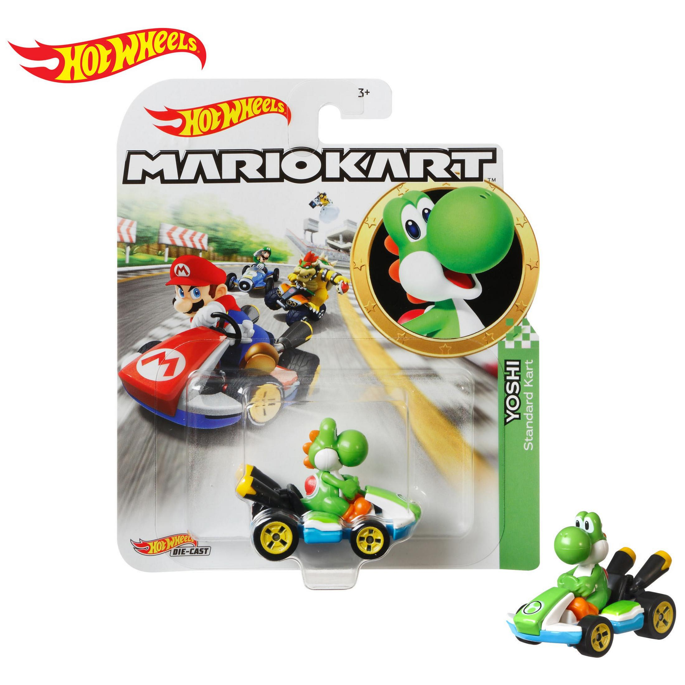 Yoshi in einem grünen Kart, mit Verpackung. Hot Wheels Logo oben links.