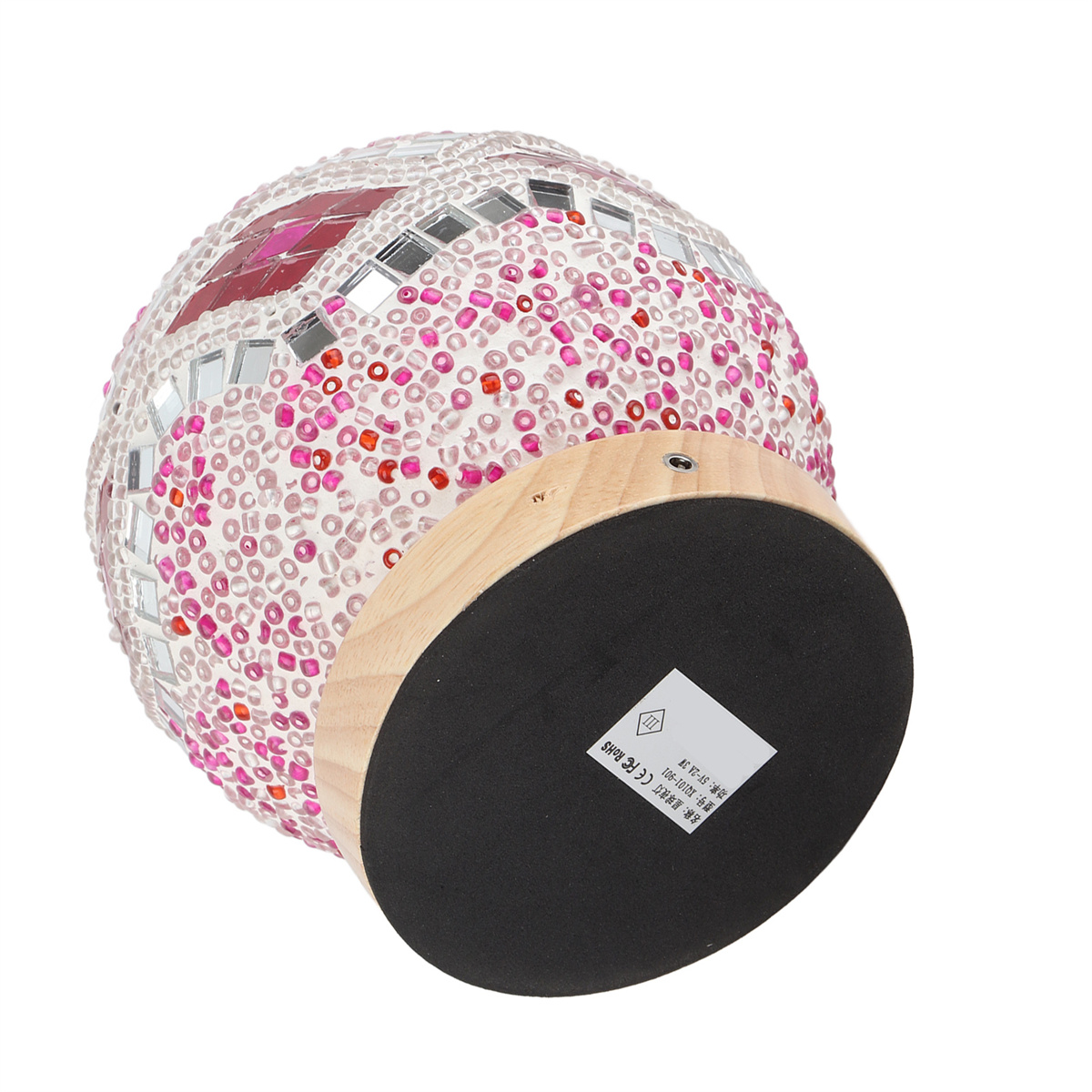 Dekorative kugelförmige Lampe mit Mosaikmuster auf Holzsockel.