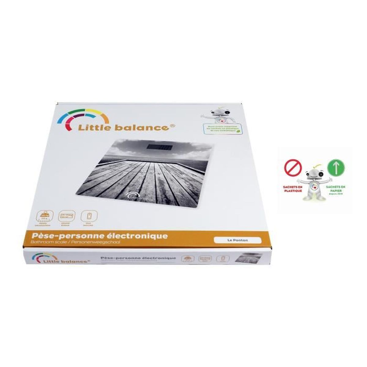 Białe pudełko z wagą w środku. Tekst po francusku, z logo i naklejką.
