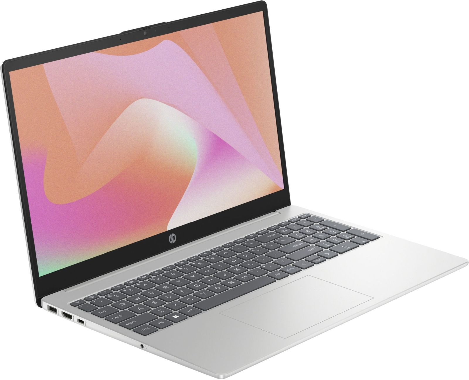 Laptop argentato con schermo aperto che mostra un gradiente rosa e arancione.