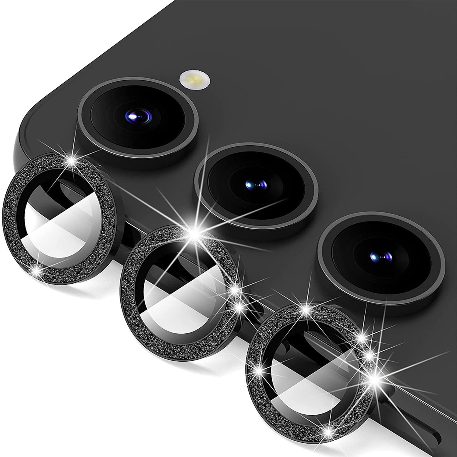 Telefono nero con tre protezioni per lenti. Protezioni con anello scintillante.