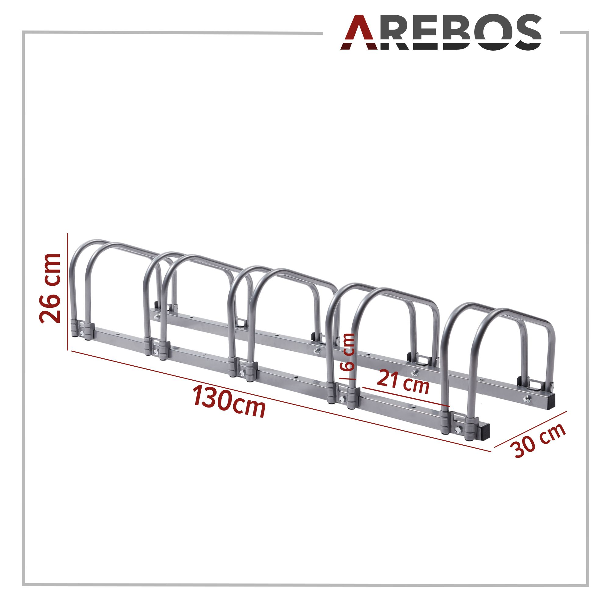 Silberner Fahrradständer mit den Maßen: 130cm, 26cm, 21cm und 30cm. Das Markenlogo befindet sich oben rechts.
