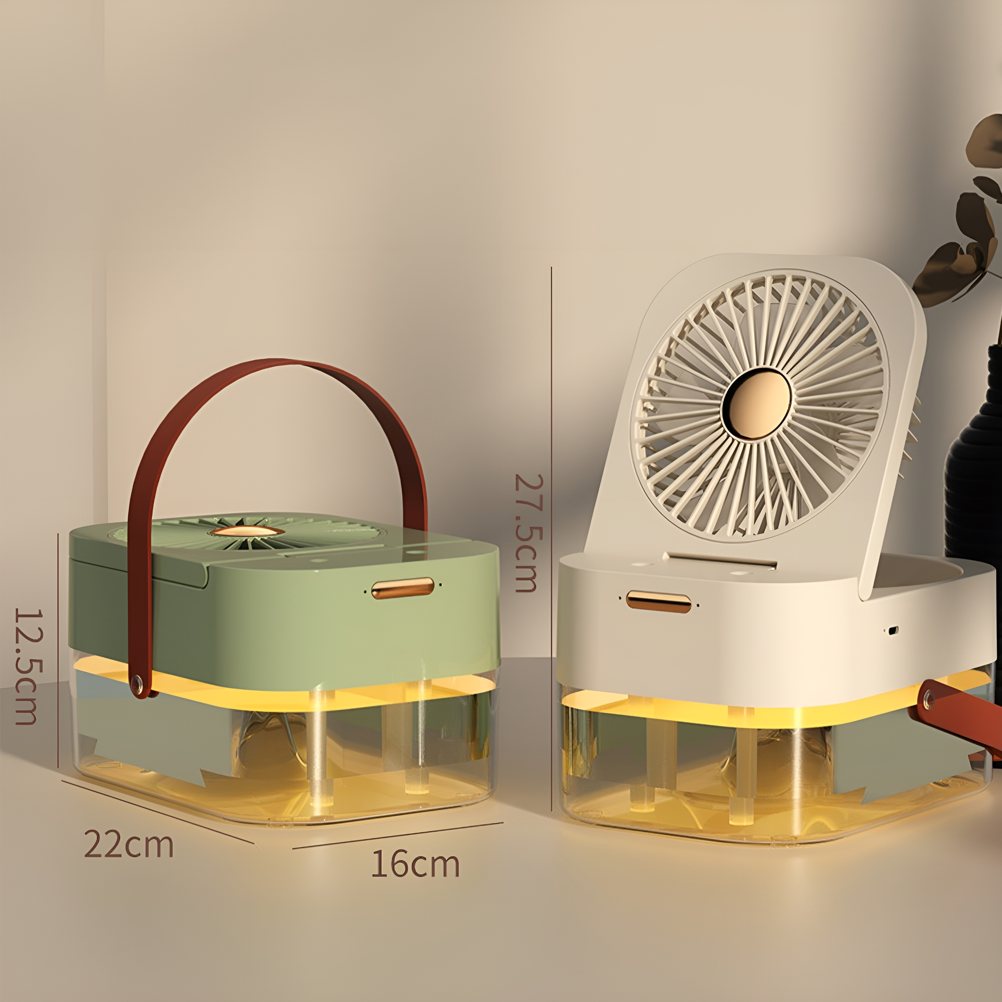 Zwei tragbare Ventilatoren, einer grün und einer weiß, auf einer Oberfläche platziert. Abmessungen sind angegeben.