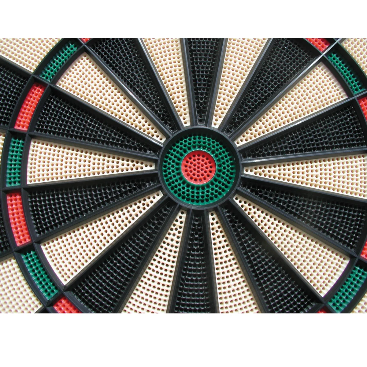 Close-up of a dartboard, black, beige, green, red, and white.