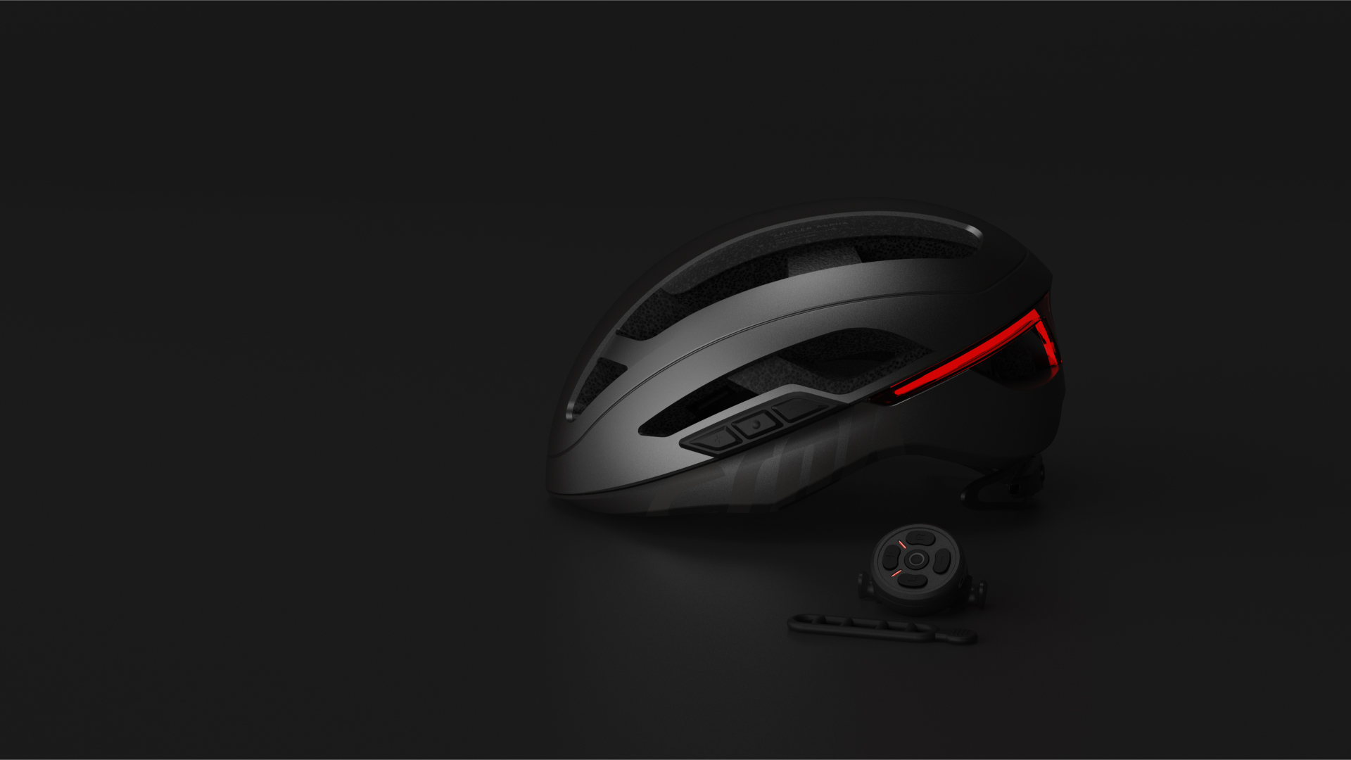Ein schwarzer Fahrradhelm mit rotem Licht hinten und einem Bedienfeld daneben.