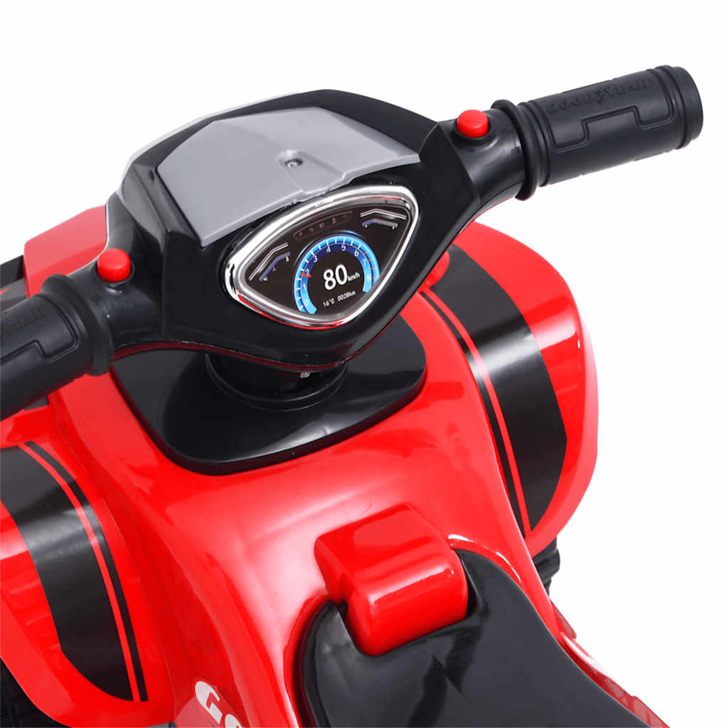 Nahaufnahme des Lenkers eines rot-schwarzen Spielzeugmotorrads mit Tachometer.
