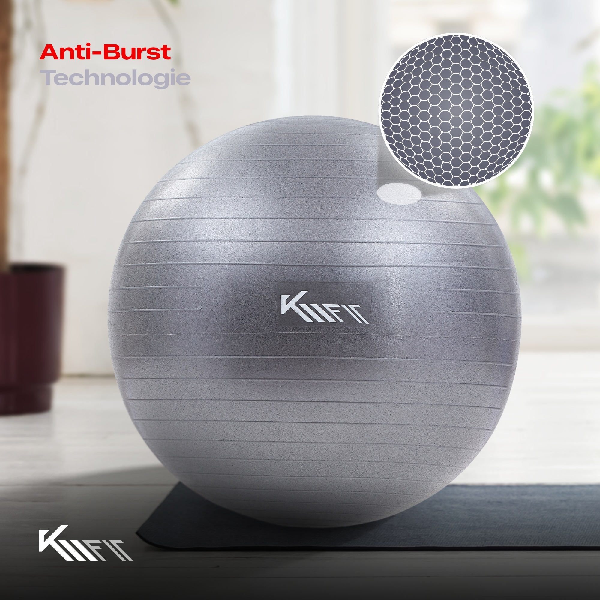 Grauer Gymnastikball mit dem 'KIIFIT'-Logo. Der Ball hat ein Wabenmuster.