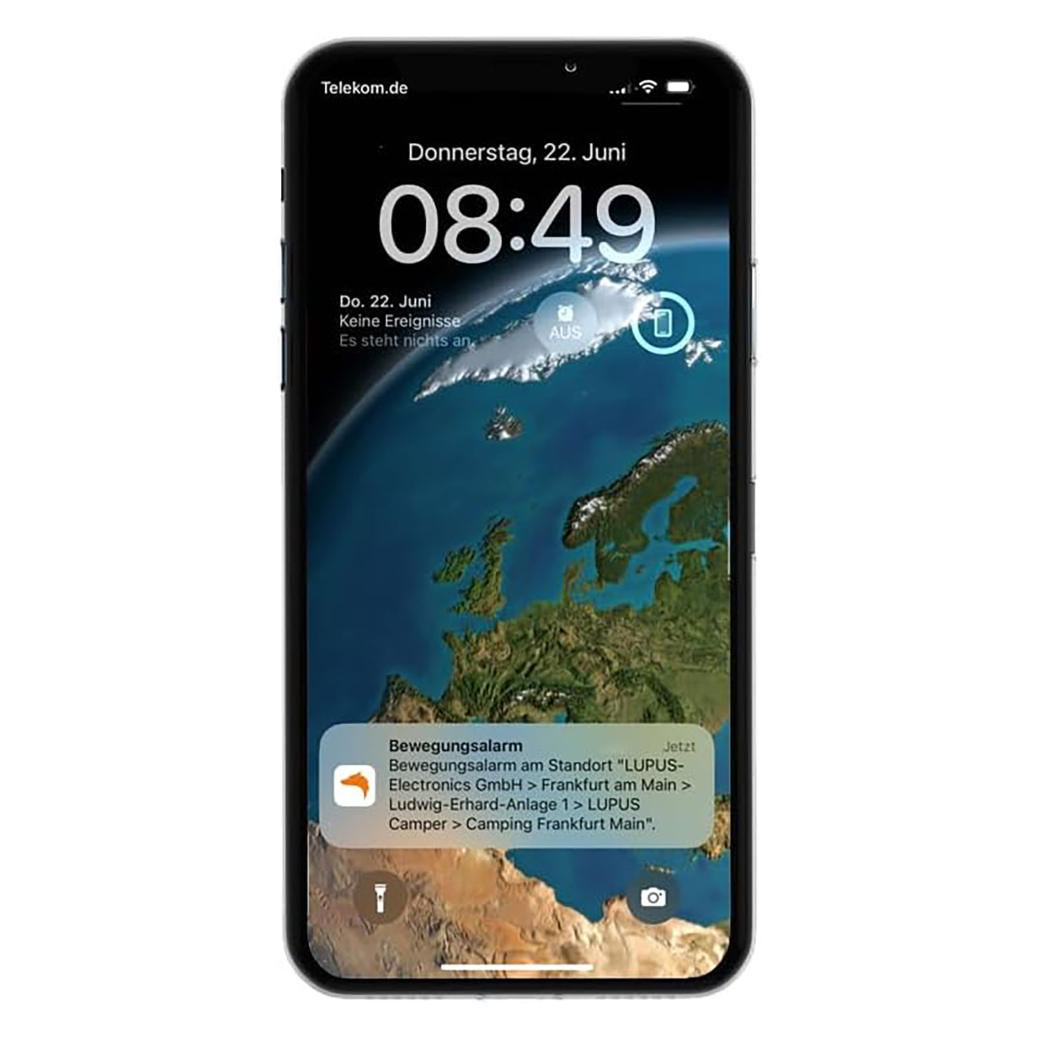 Ein Telefon zeigt einen Sperrbildschirm mit Uhrzeit und Datum. Eine Benachrichtigung ist unten sichtbar.