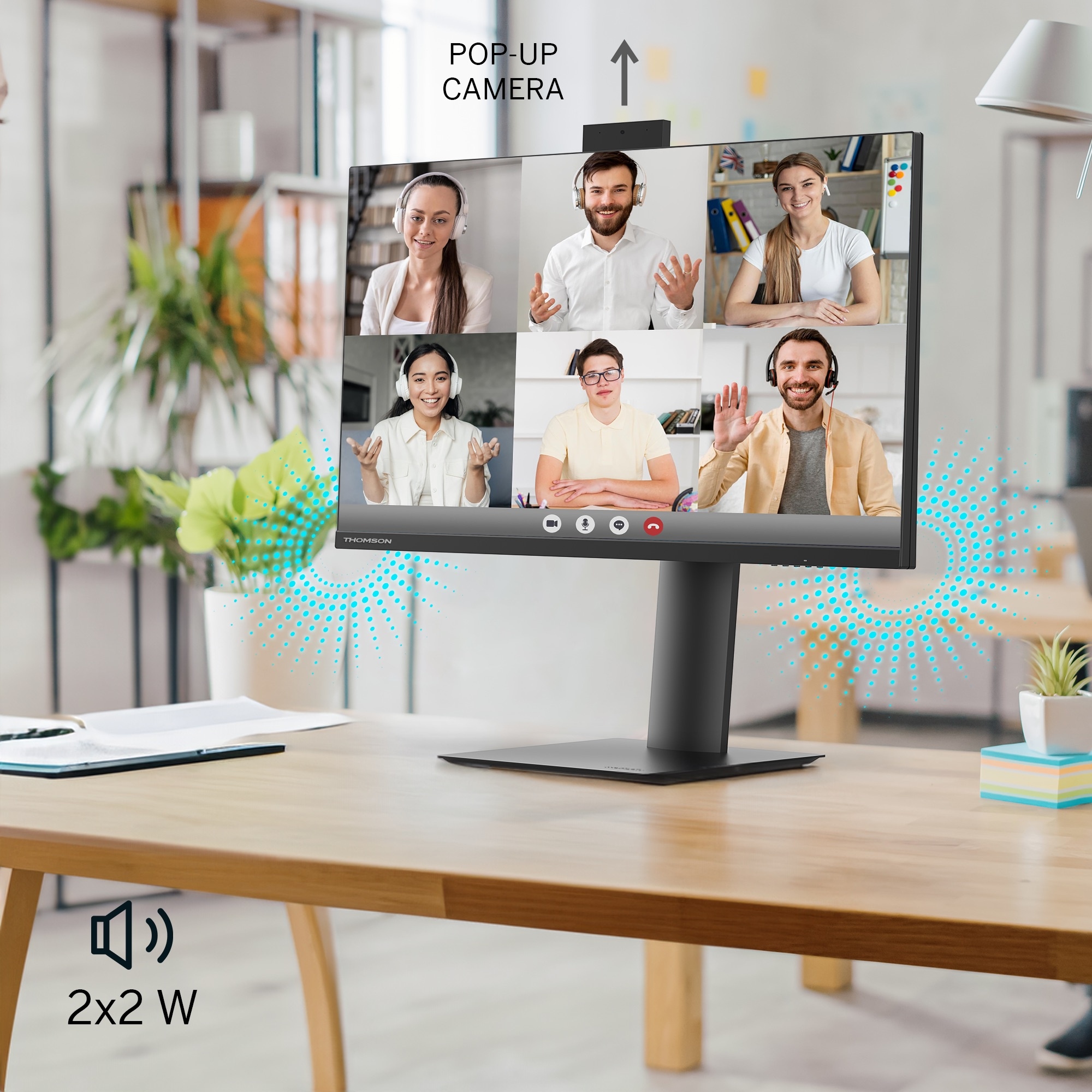 Desktop-Monitor, der einen Videoanruf mit mehreren Personen anzeigt. Ein Schreibtisch mit anderen Objekten.
