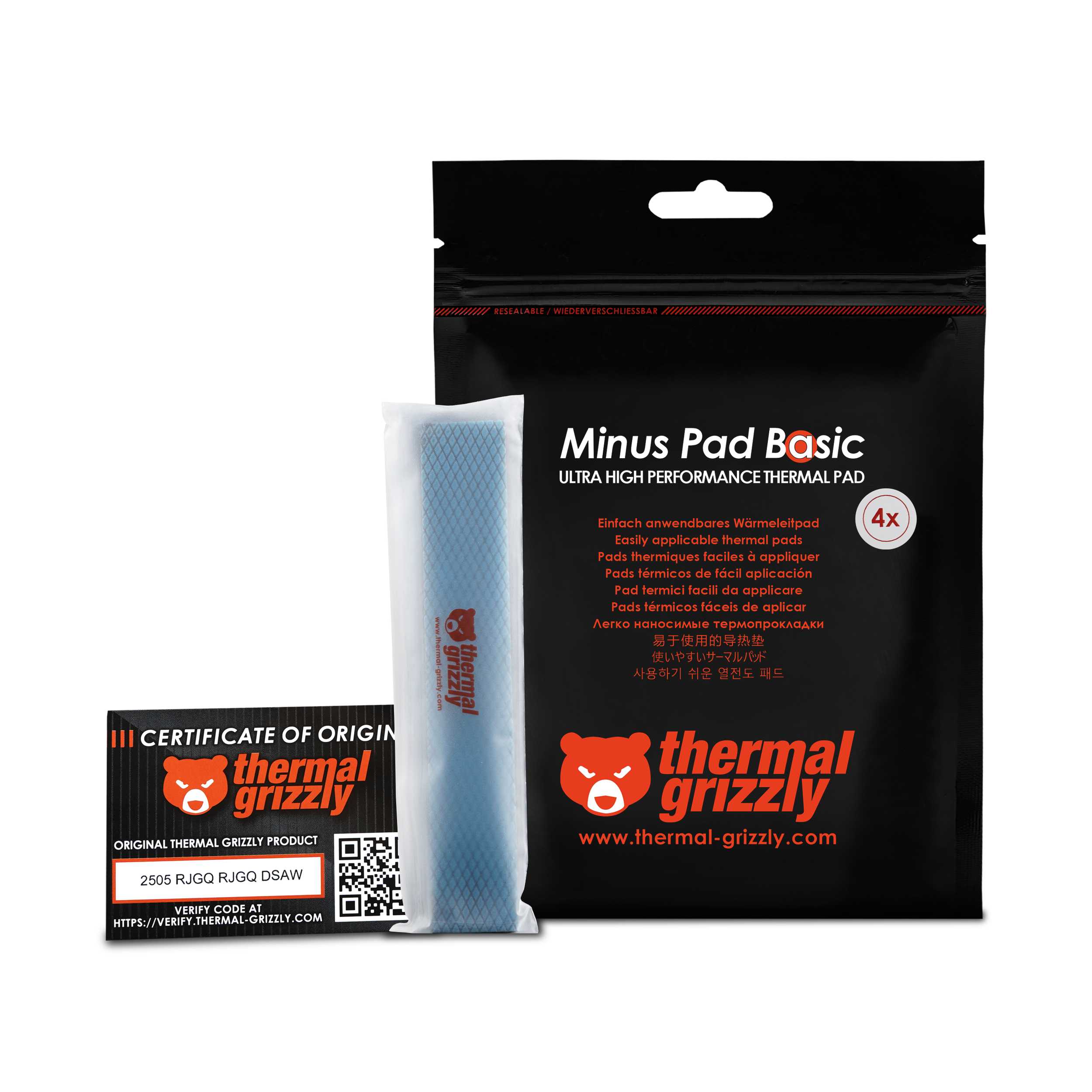 Eine schwarze Packung mit der Aufschrift „Minus Pad Basic“ und ein weißes Wärmeleitpad neben einem Zertifikat.