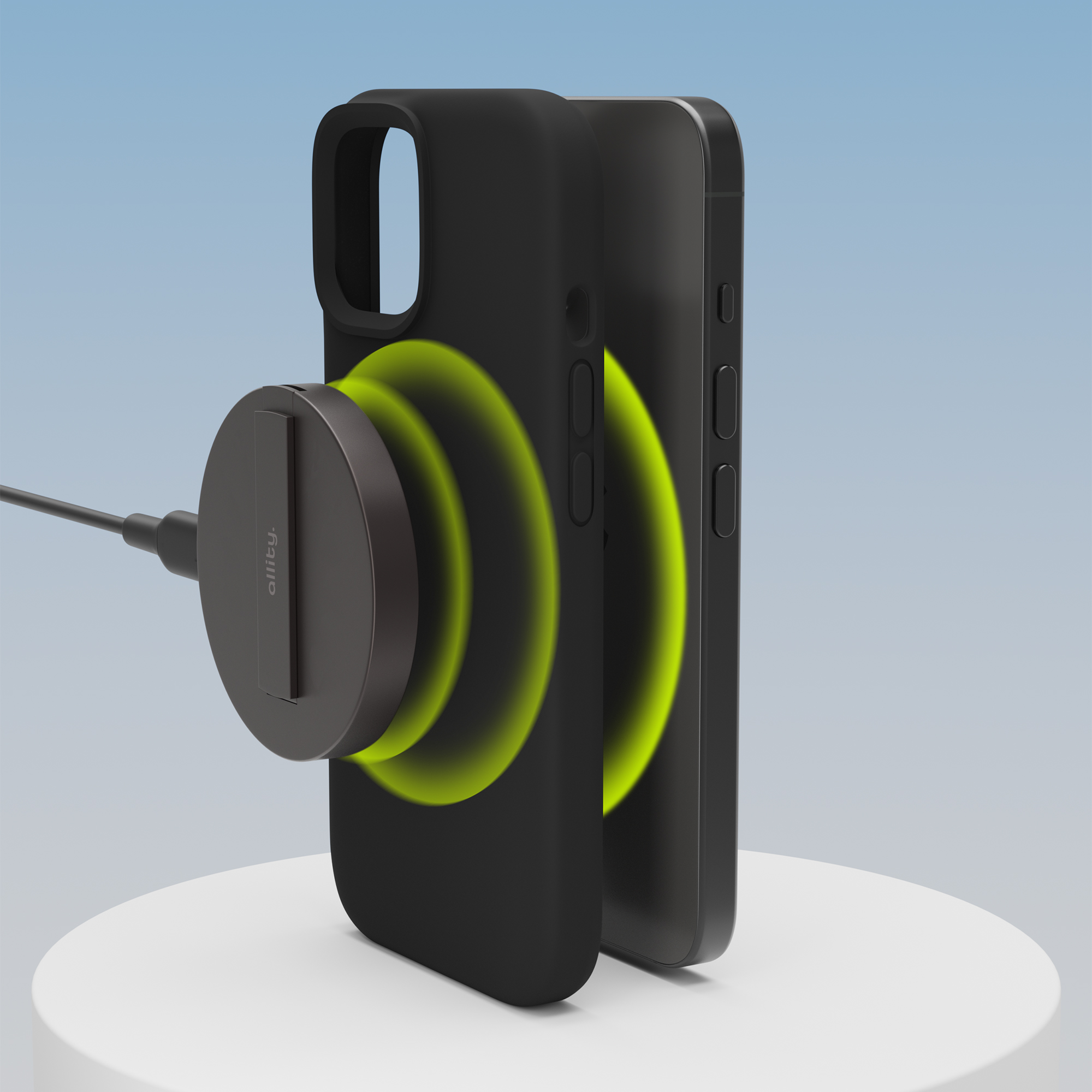Telefon z czarnym etui i okrągłą ładowarką na białym stojaku, z niebieskim tłem.