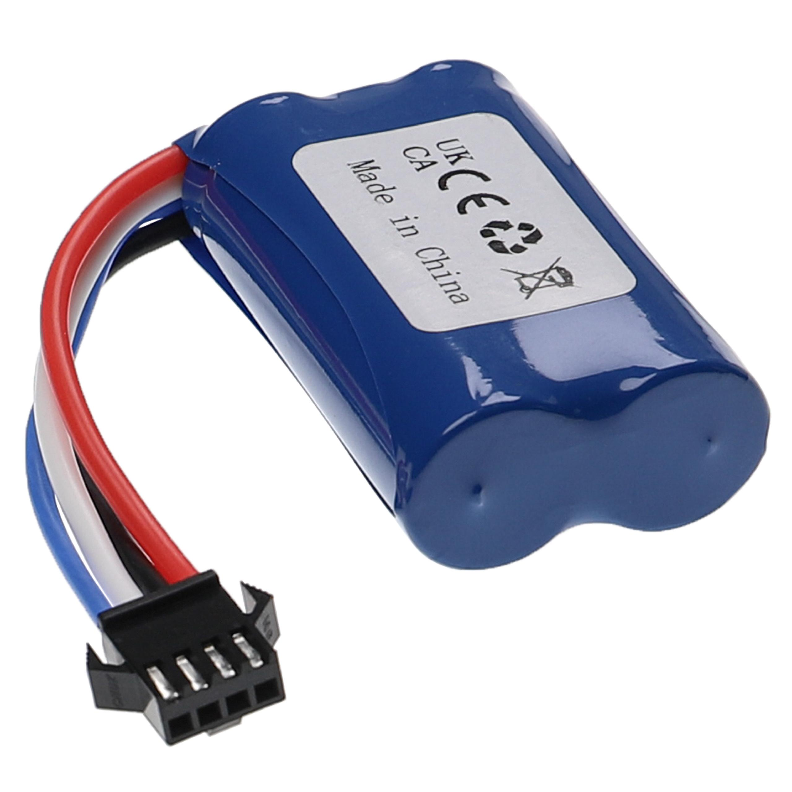 Eine blaue Batterie mit schwarzen, weißen und roten Drähten, die mit einem schwarzen Stecker verbunden sind.