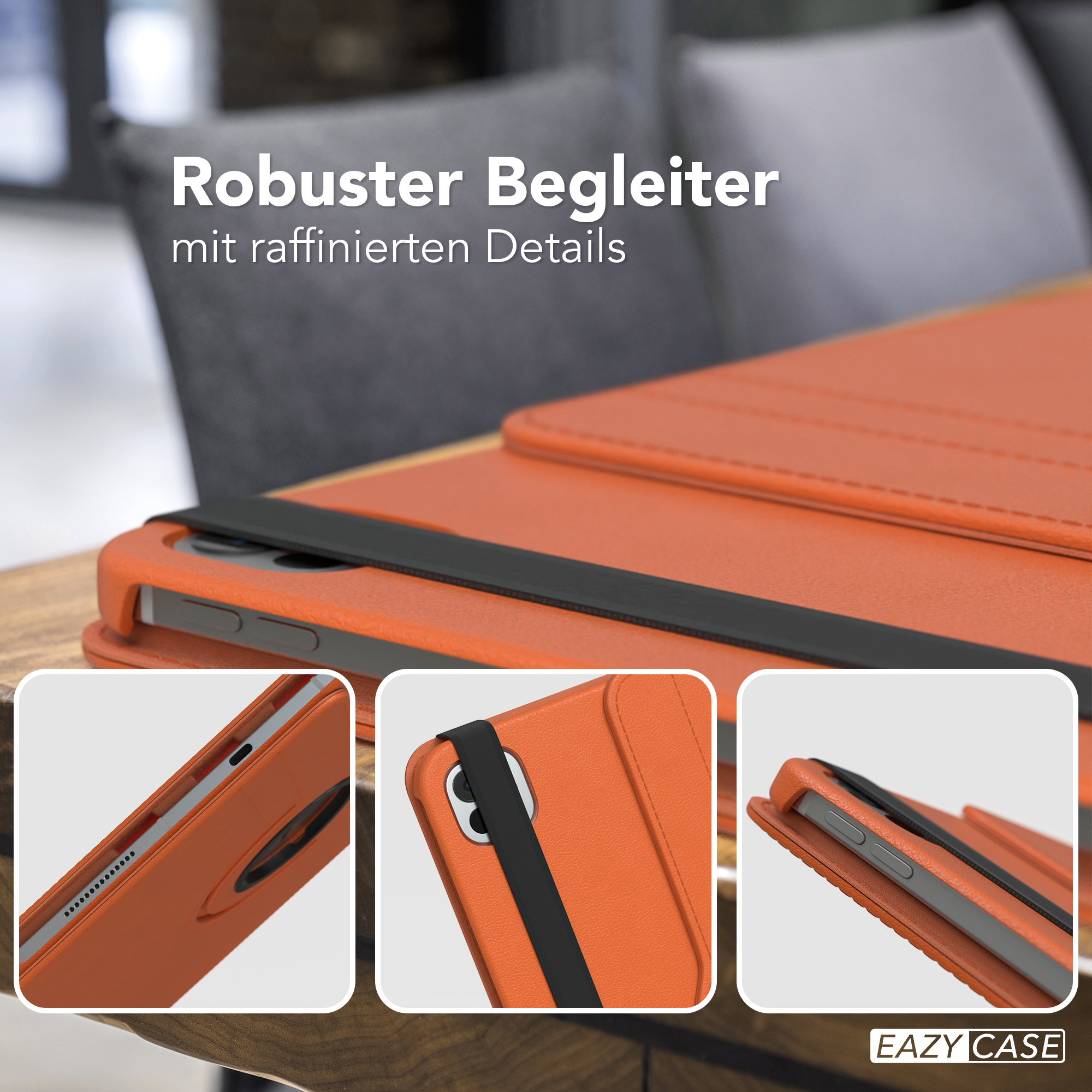 Orangefarbene iPad-Hülle mit schwarzem Riemen. Nahaufnahmen zeigen die Details. Hintergrund: ein Sofa.