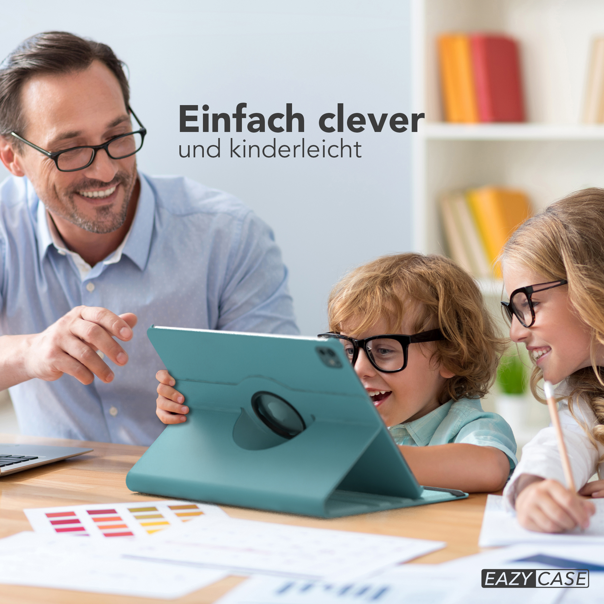 Vater und Kinder mit Tablet. Die Kinder lächeln. Helle und freundliche Atmosphäre.