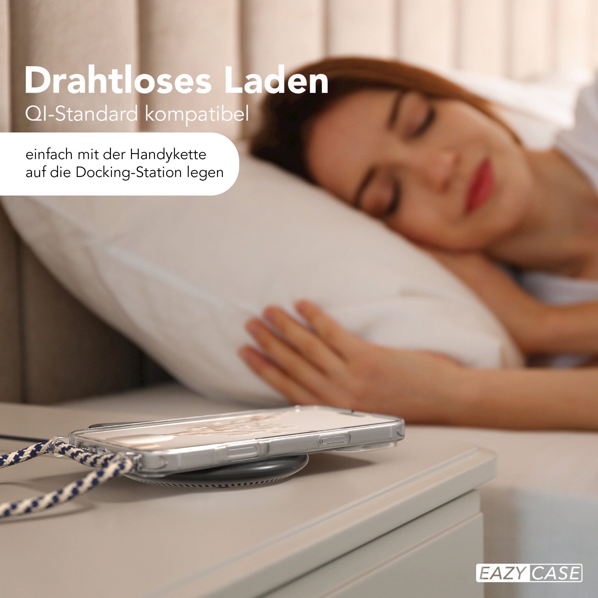Eine schlafende Frau neben einem Telefon, das drahtlos auf einem Nachttisch geladen wird.