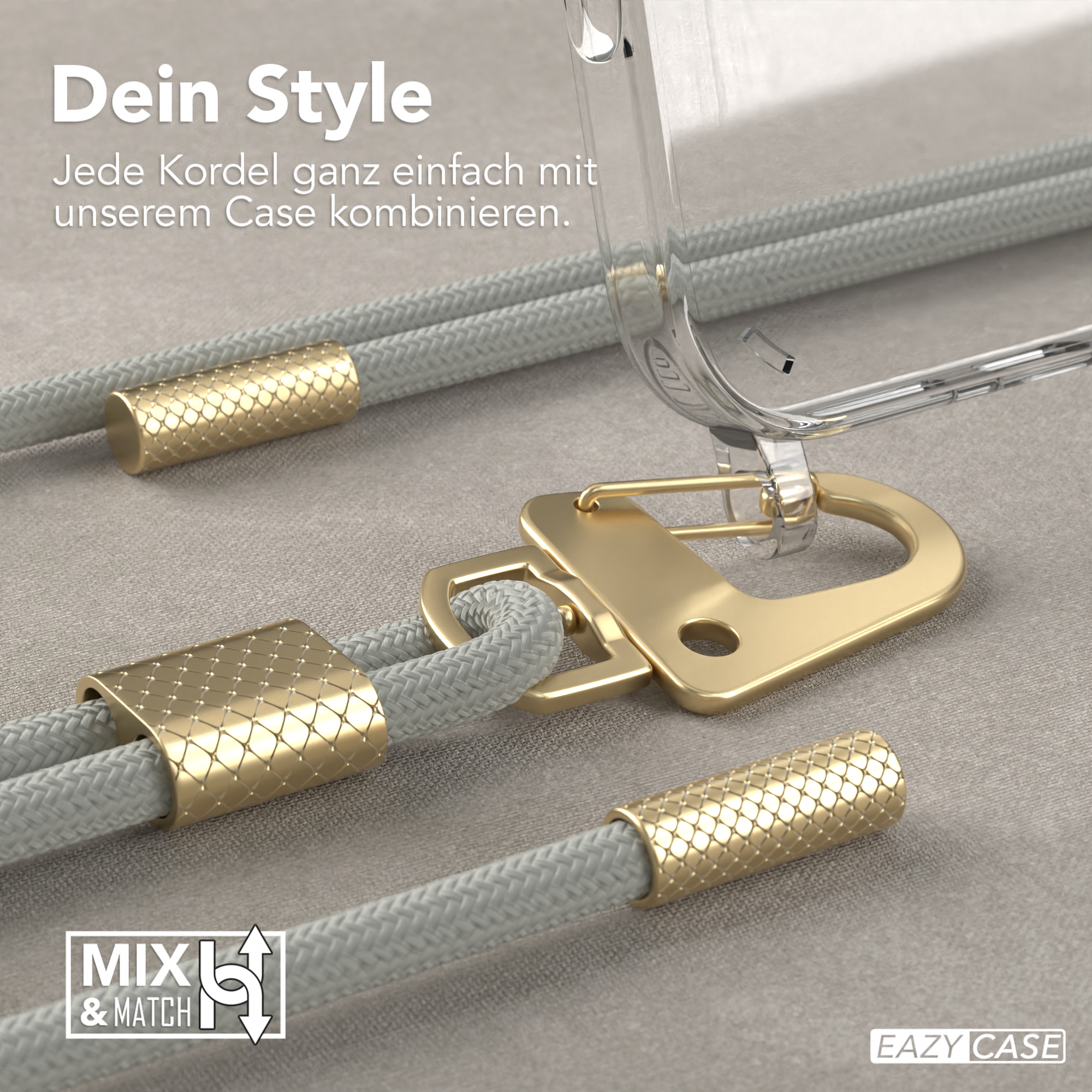 Nahaufnahme von Handyhüllen-Zubehör. Ein graues Kabel mit goldenen Akzenten und ein Verschluss mit Gold-Finish.