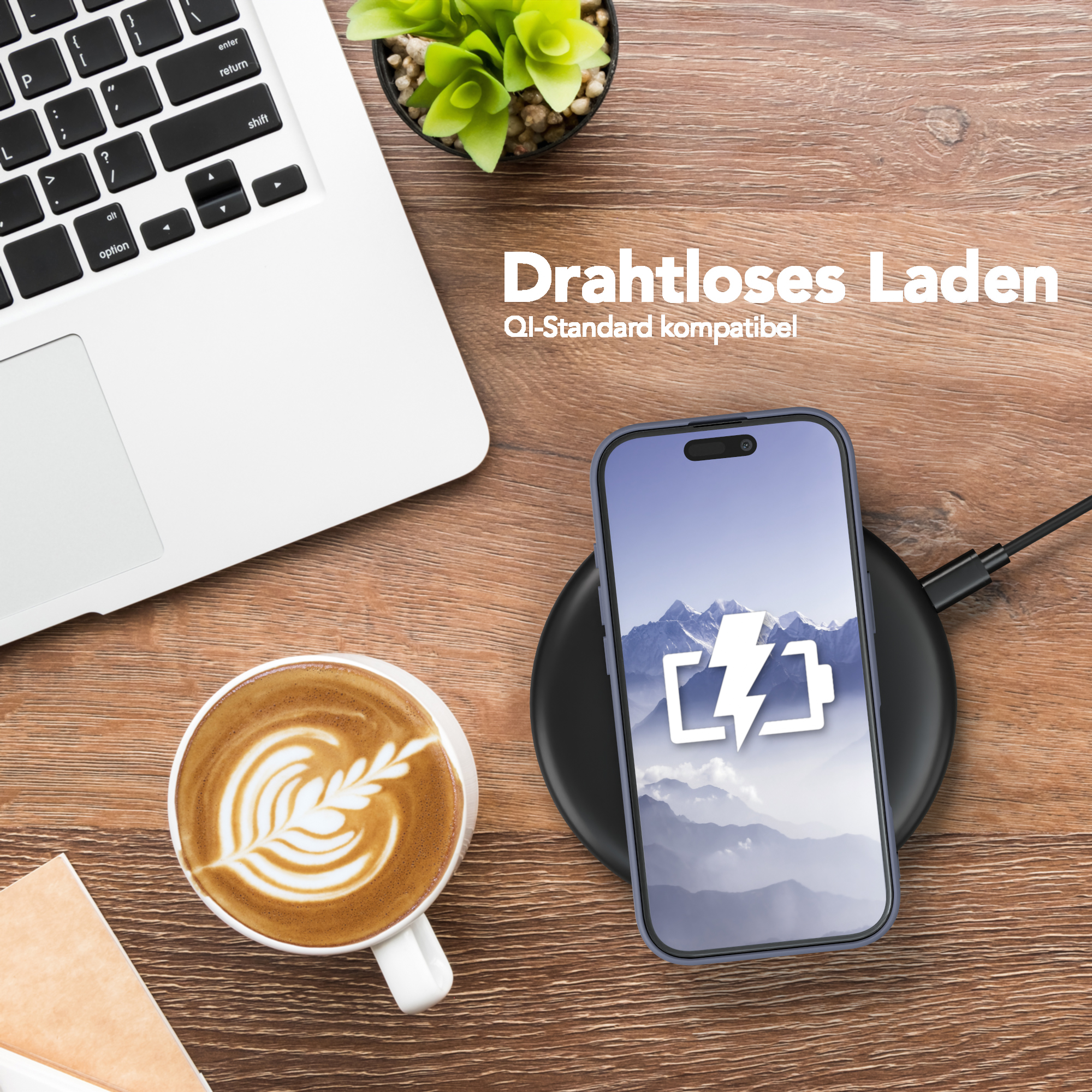 Telefon wird drahtlos auf einem Pad geladen, neben einem Laptop und einer Kaffeetasse. Text 'Wireless Charging'.
