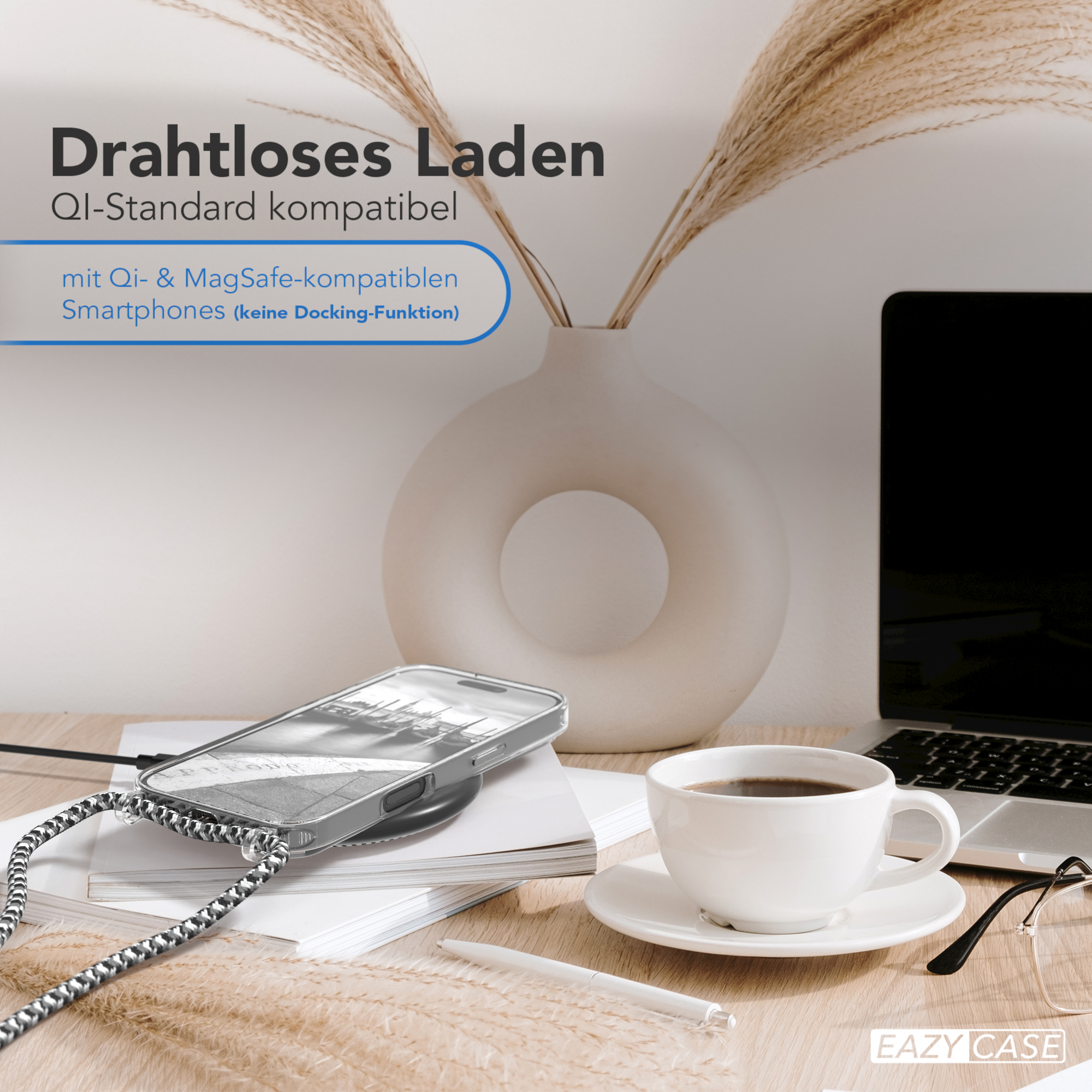 Ein Telefon, das auf einem kabellosen Ladegerät geladen wird, mit einer Kaffeetasse. Text erwähnt kabelloses Laden.
