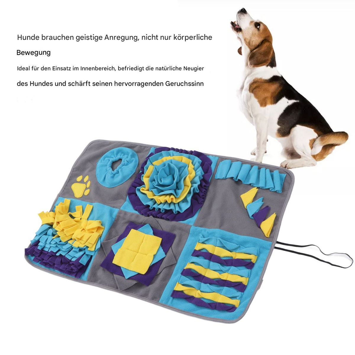 Ein Hund mit einer Spielmatte mit verschiedenen Formen und Texturen. Der Hund bellt mit offenem Maul.