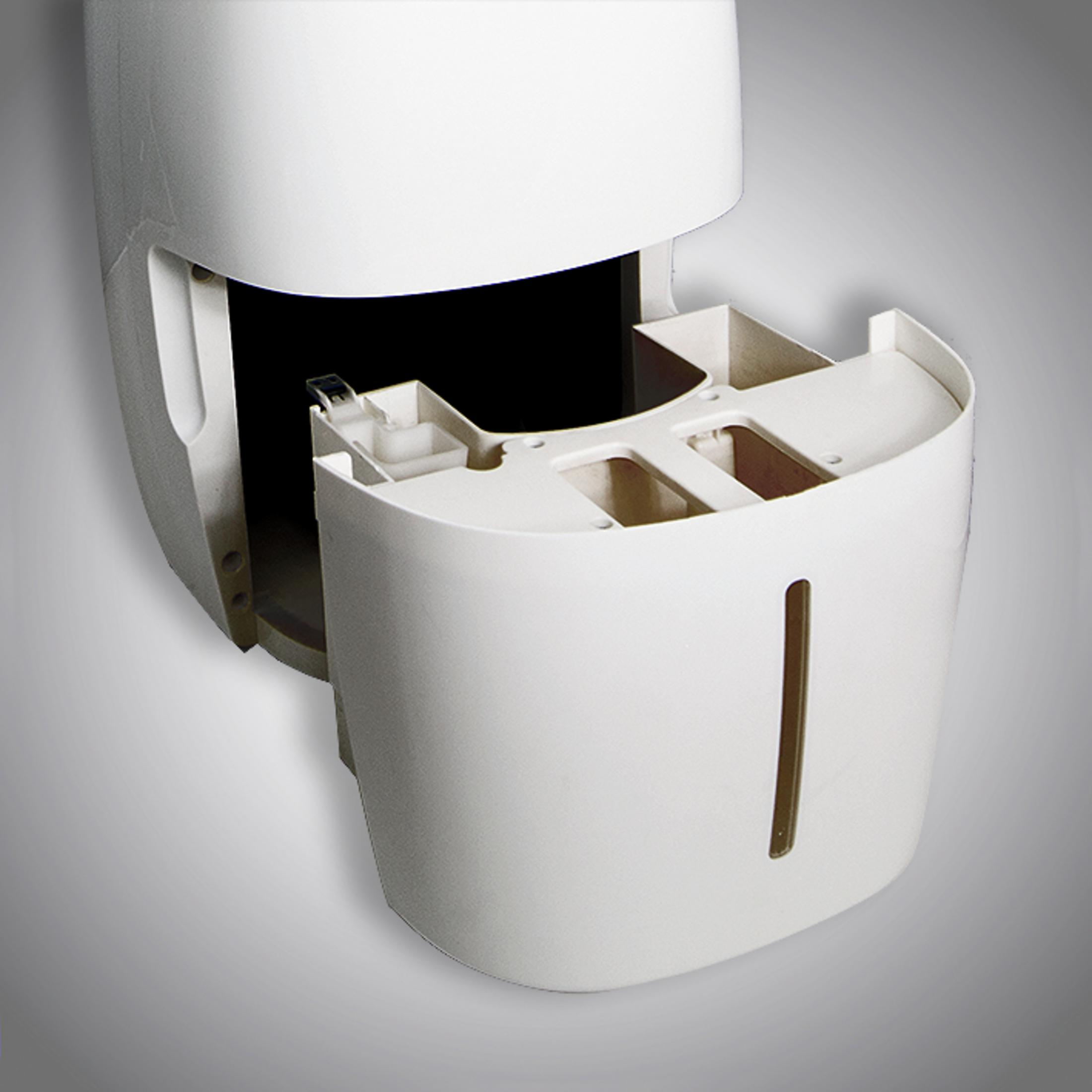 Conteneur ouvert d'un distributeur en plastique blanc. Intérieur noir, montrant une zone de recharge.